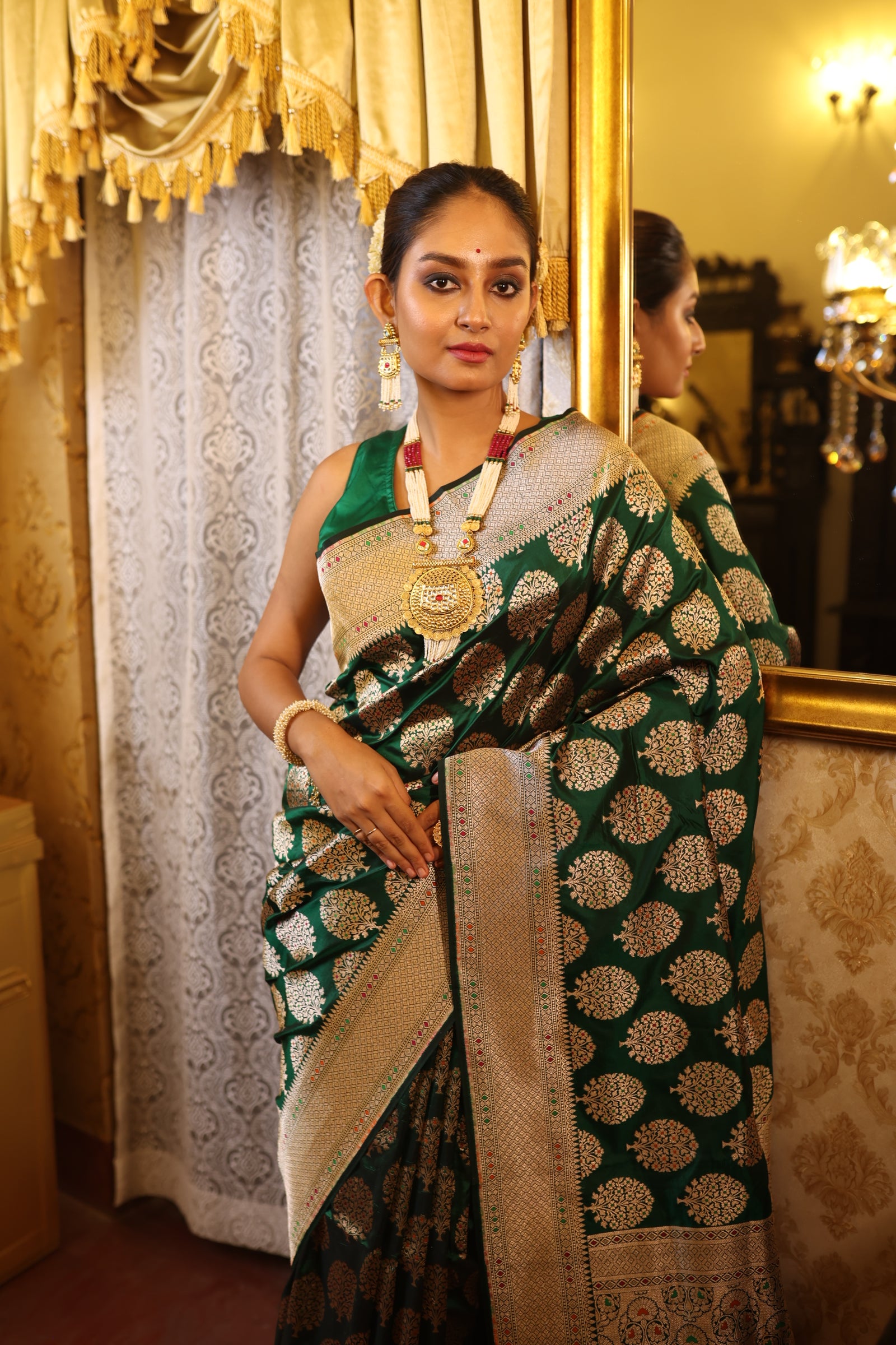 Bhumika || Bottle Green Pure Katan Banarasi Saree with all over Tree motif woven in Matte Gold Zari and Meenakari highlights