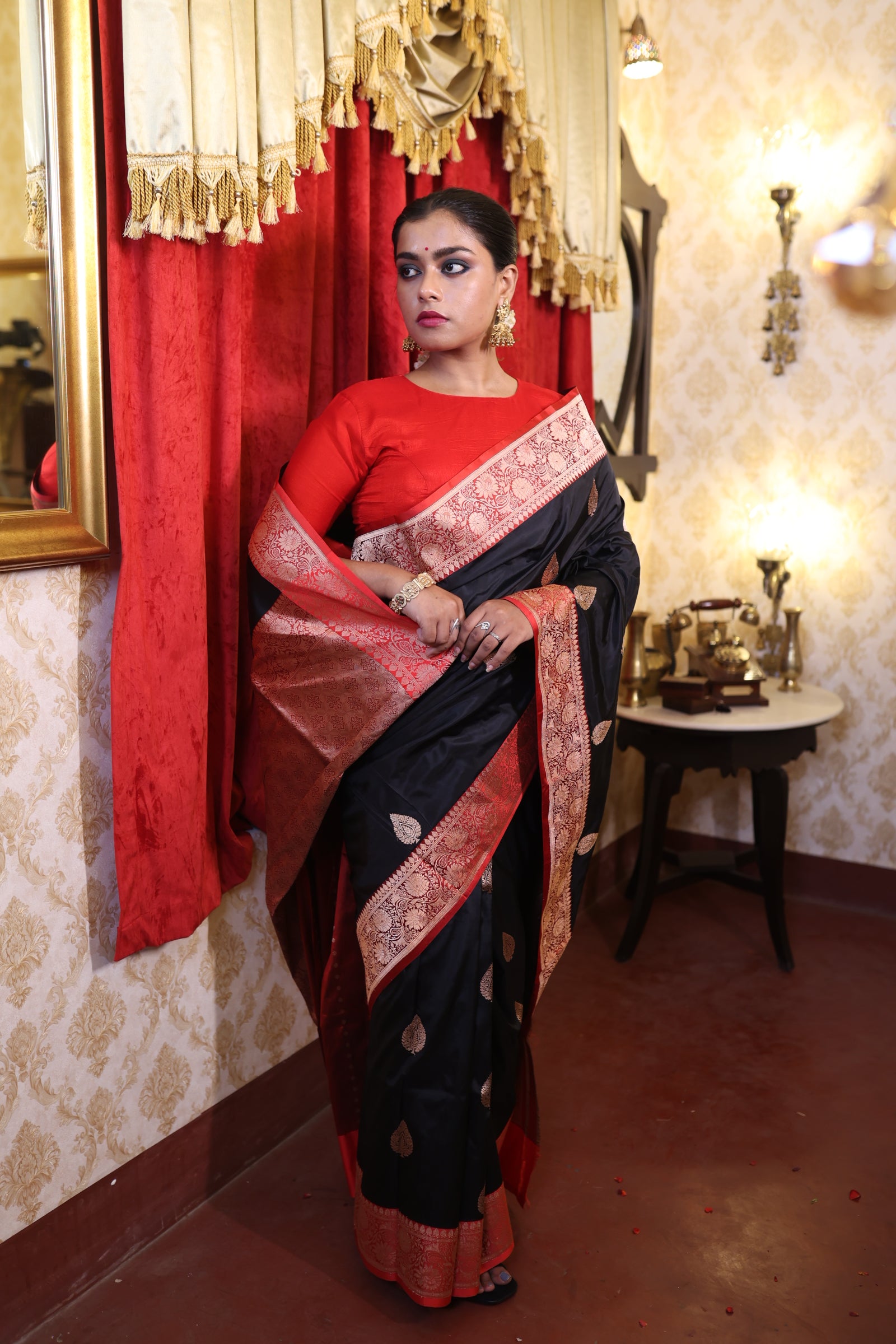 Kamini || Black Pure Katan Handloom Banarasi Saree with all over Copper Zari Kadhua Buta and Red border