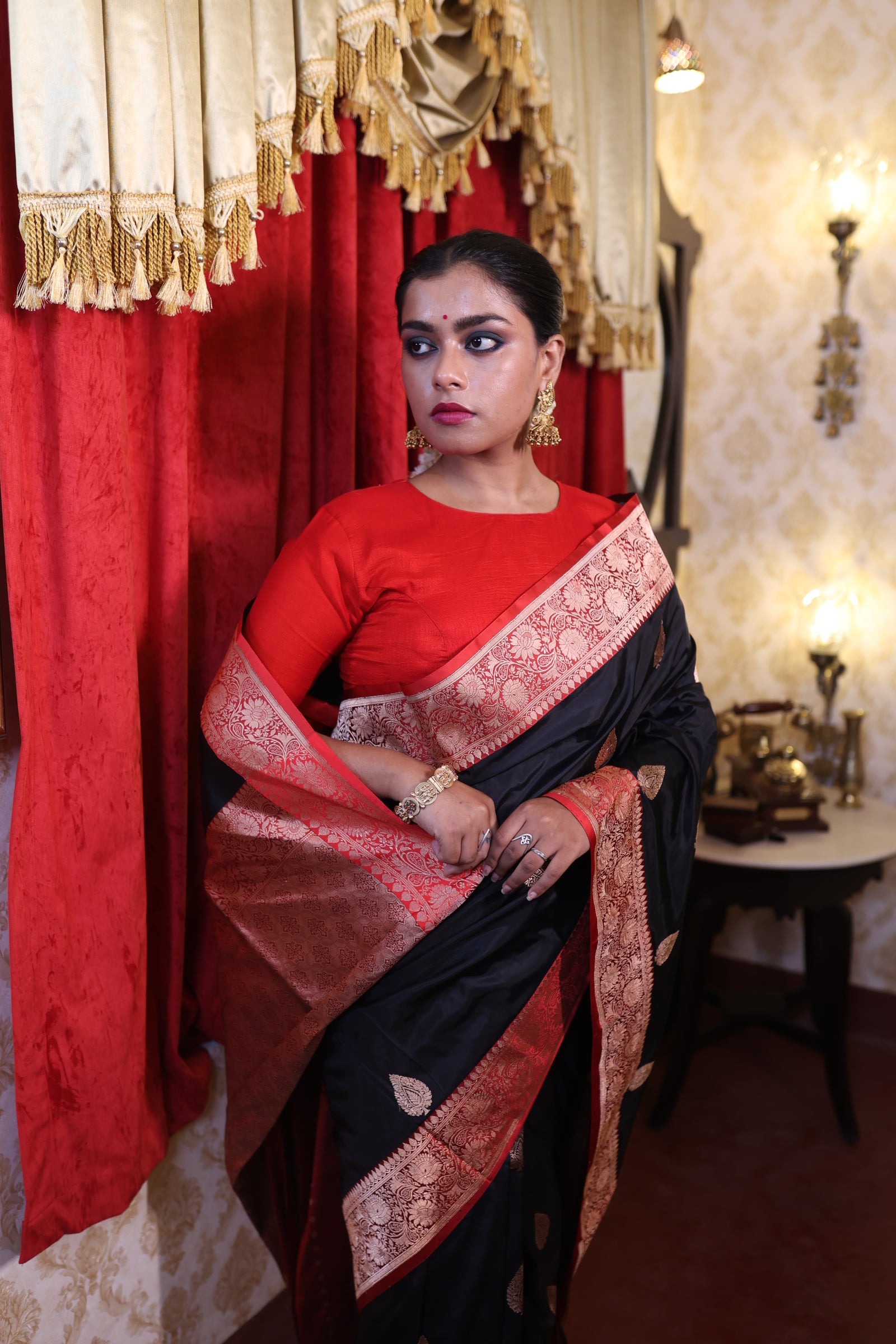 Kamini || Black Pure Katan Handloom Banarasi Saree with all over Copper Zari Kadhua Buta and Red border