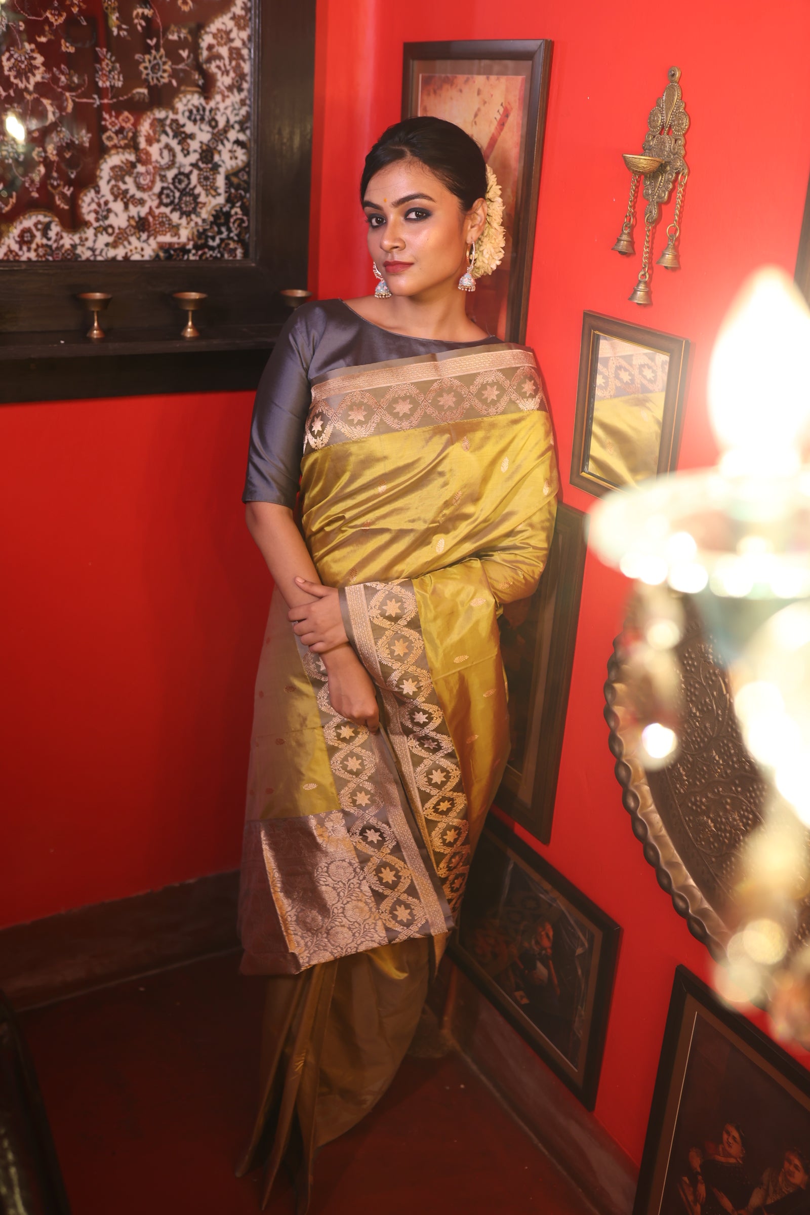 Tara || Olive Green Pure Katan Handloom Banarasi Saree with all over Antique Gold Zari Kadhua Buta and 'Star' motif Grey border