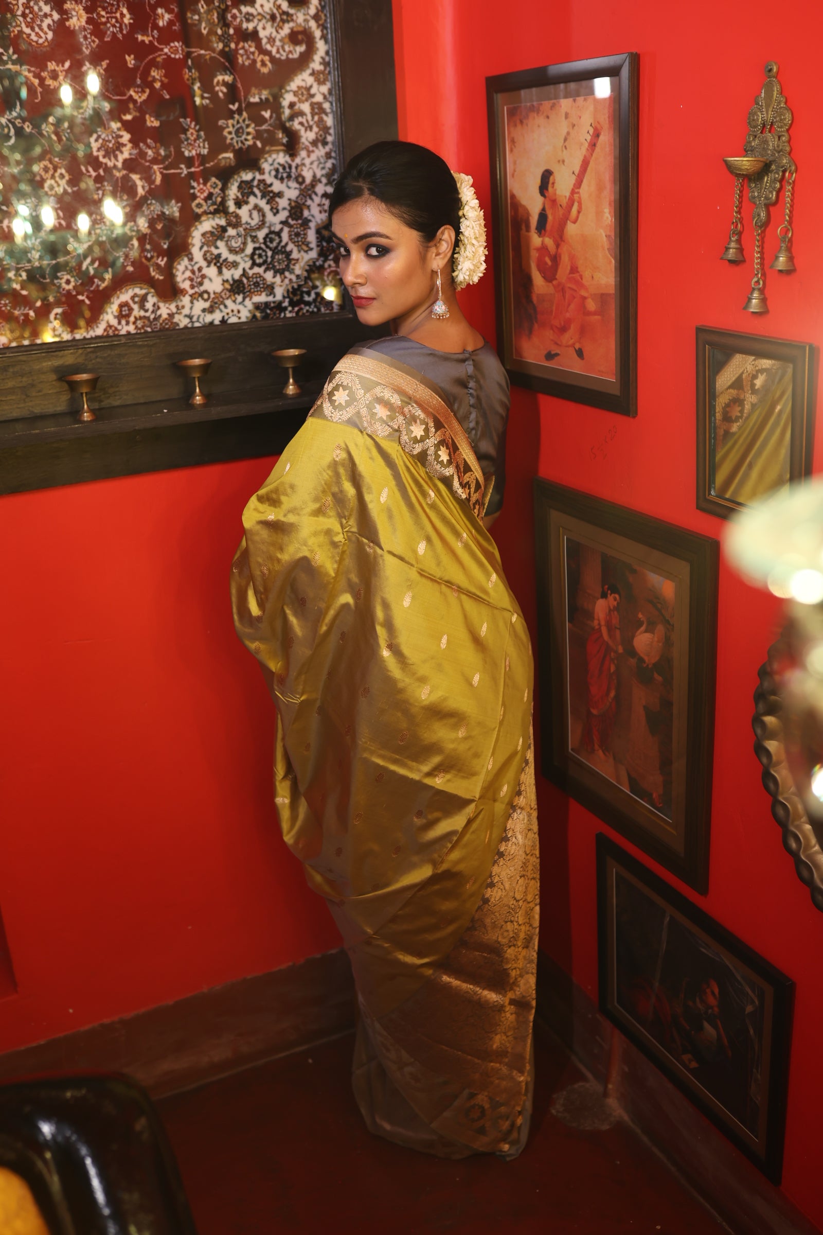 Tara || Olive Green Pure Katan Handloom Banarasi Saree with all over Antique Gold Zari Kadhua Buta and 'Star' motif Grey border