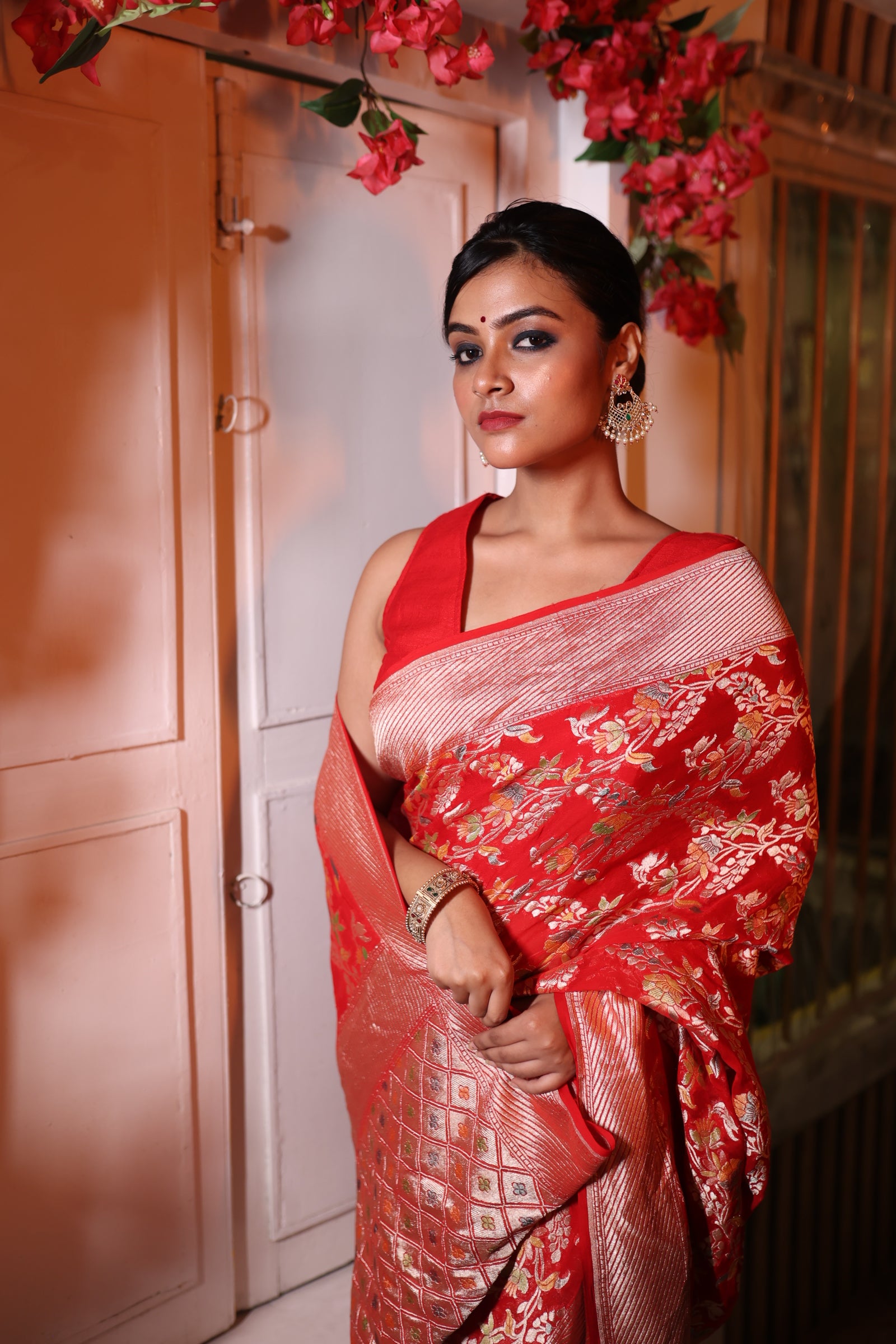 Mohini || Bright Red Khaddi Georgette Banarasi Saree with all over Rifling Handbrush Multi-colour & Matte Gold Zari Floral motif and Jaal