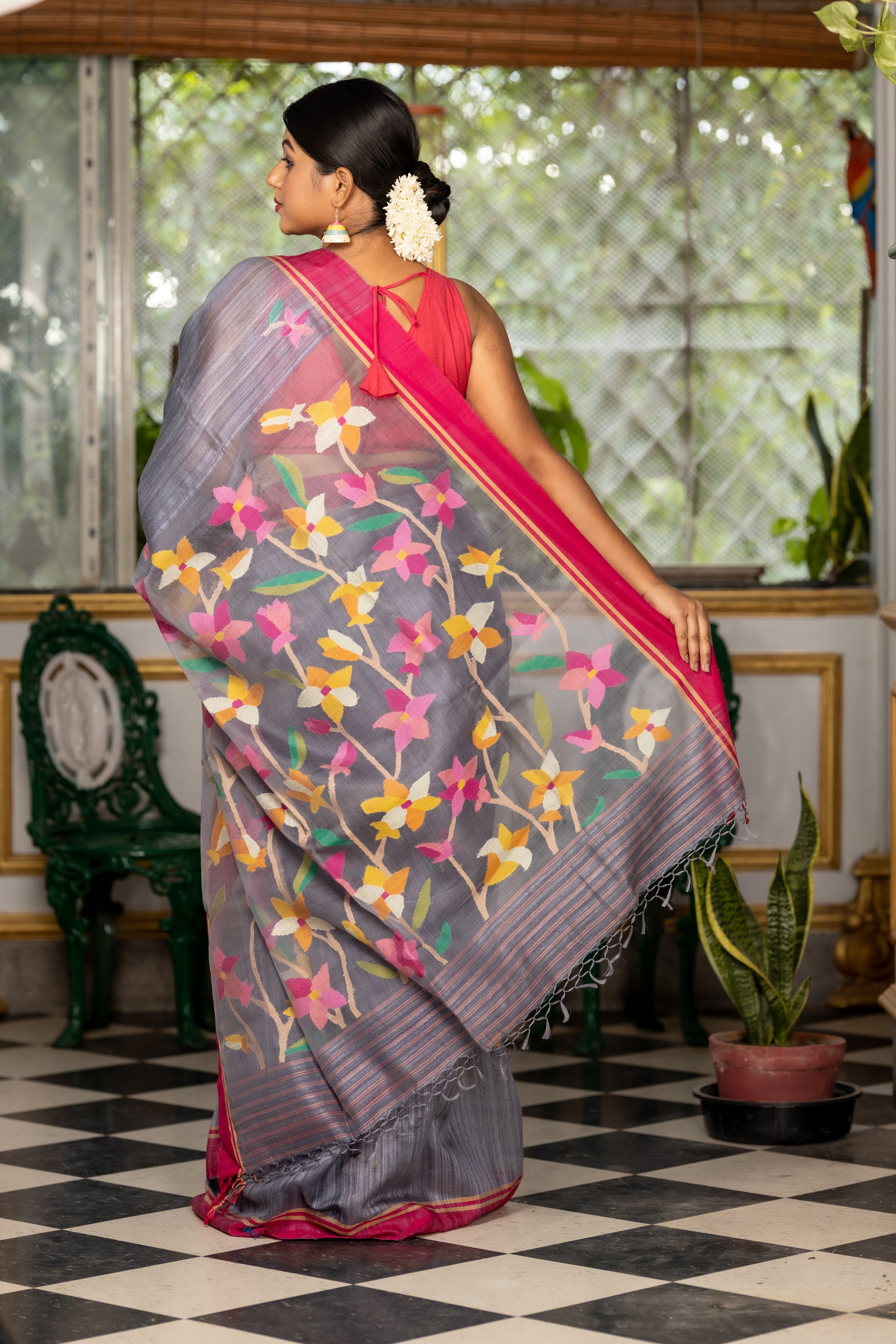 Pushpika || Steel Grey Premium 'Matka-Muslin' Bengal Handloom Saree with all over Multi-colour Floral 'Tantuja' Jamdani Buta on Matka body & Muslin Pallu