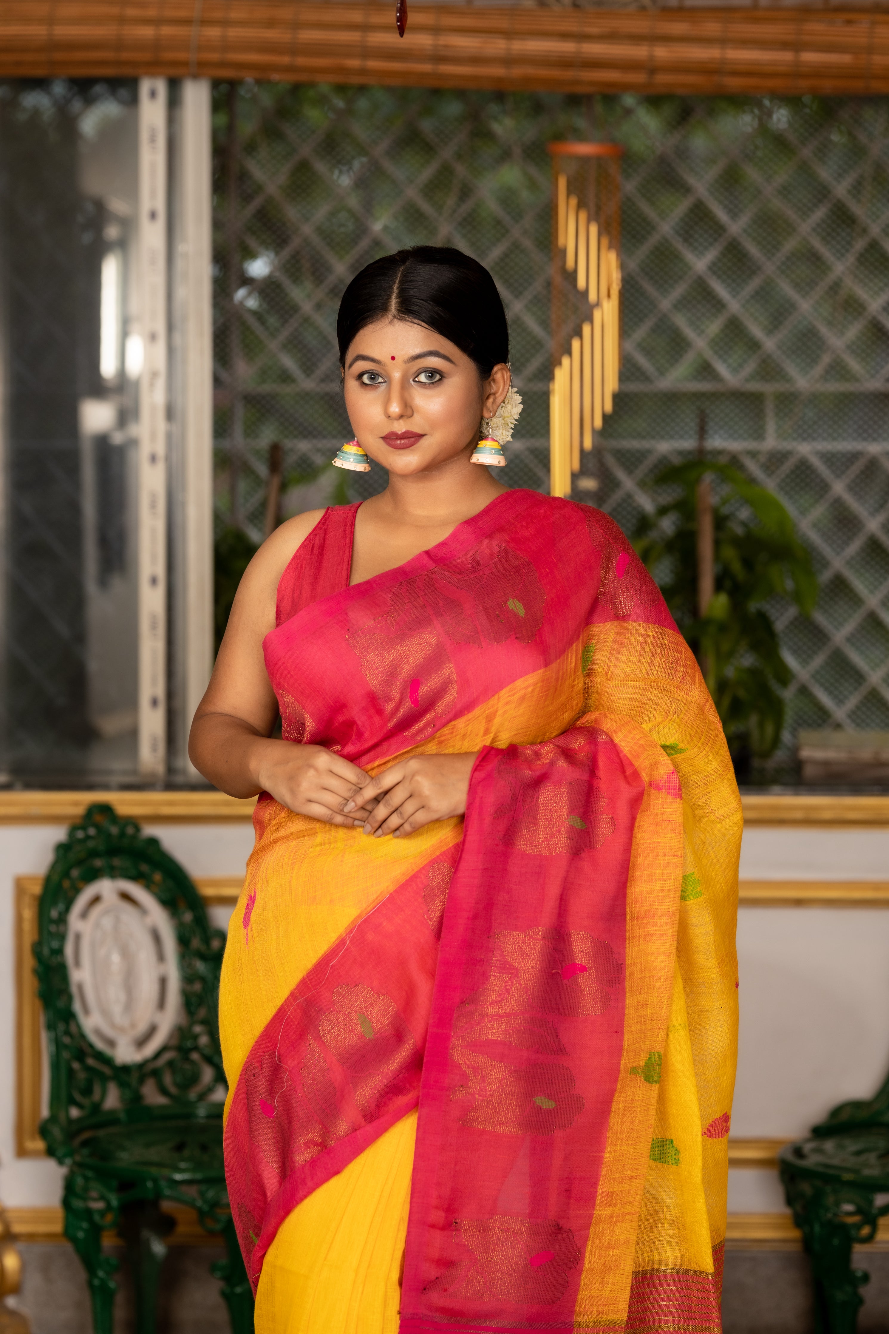 Haridra || Sunflower Yellow Linen Bengal Handloom Saree with all over Multi-colour Buta, Magenta 'Mahapadh' & Antique Gold Zari 'Small Hibiscus' motif Border and Pallu