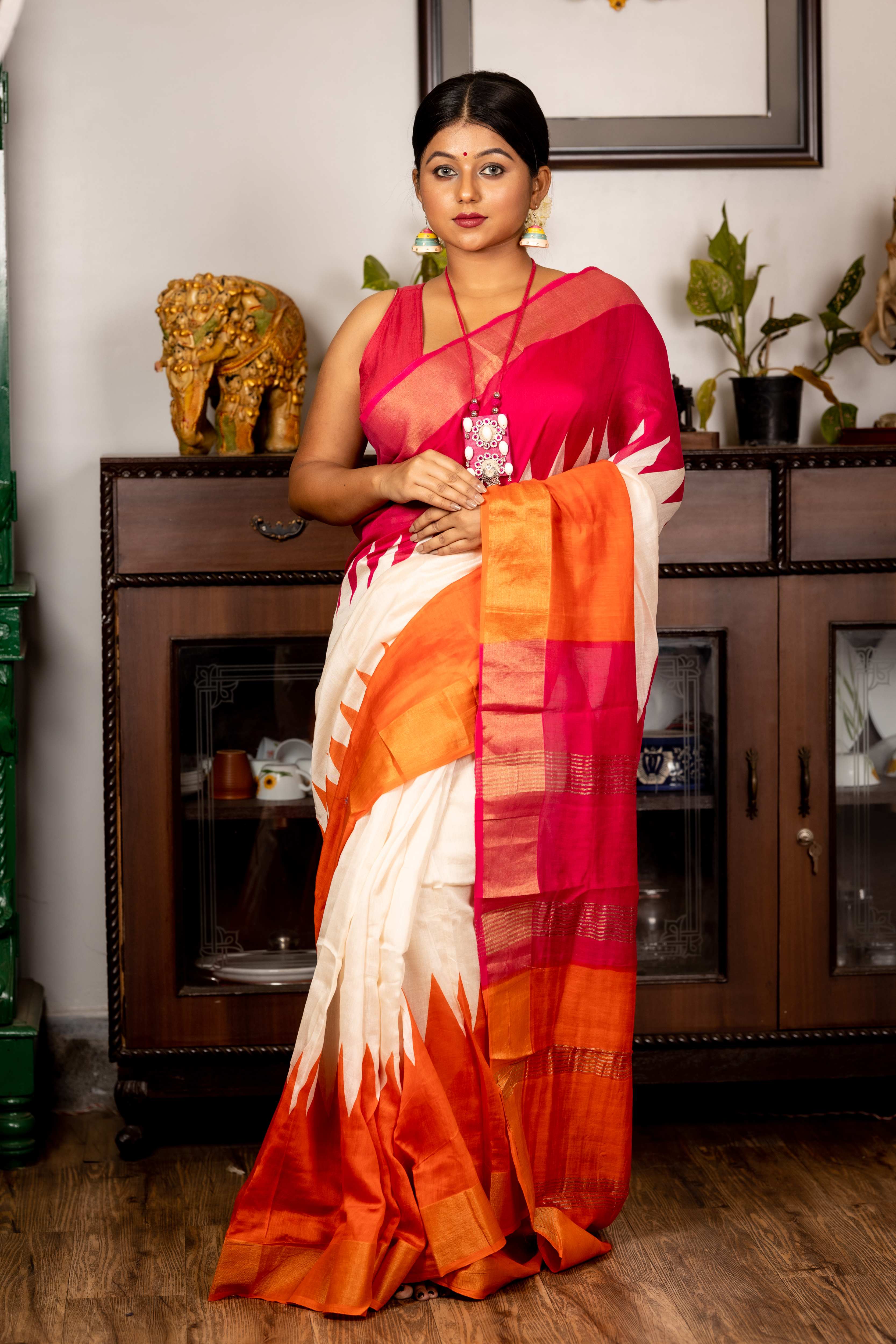 Amrita || Off-White Bapta Tussar Saree with Plain Body, Magenta Pink & Bright Orange 'Temple' with Golden Zari Border and dual shaded with Matte Silver & Golden Stripe Pallu