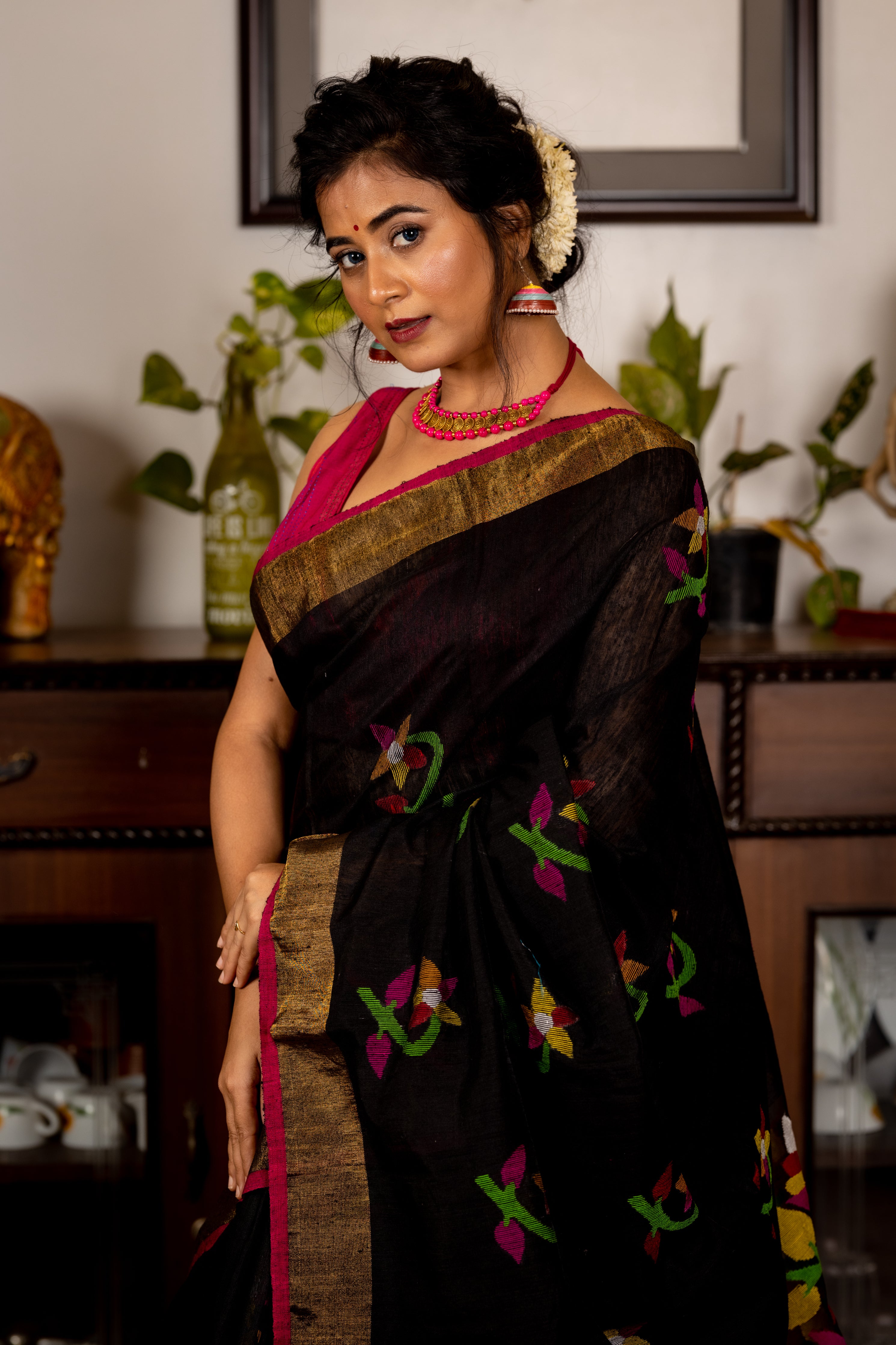 Madhumalati || Black Premium 'Matka-Muslin' Bengal Handloom Saree with all over Multi-colour Floral Jamdani Buta on Matka body & Muslin Pallu