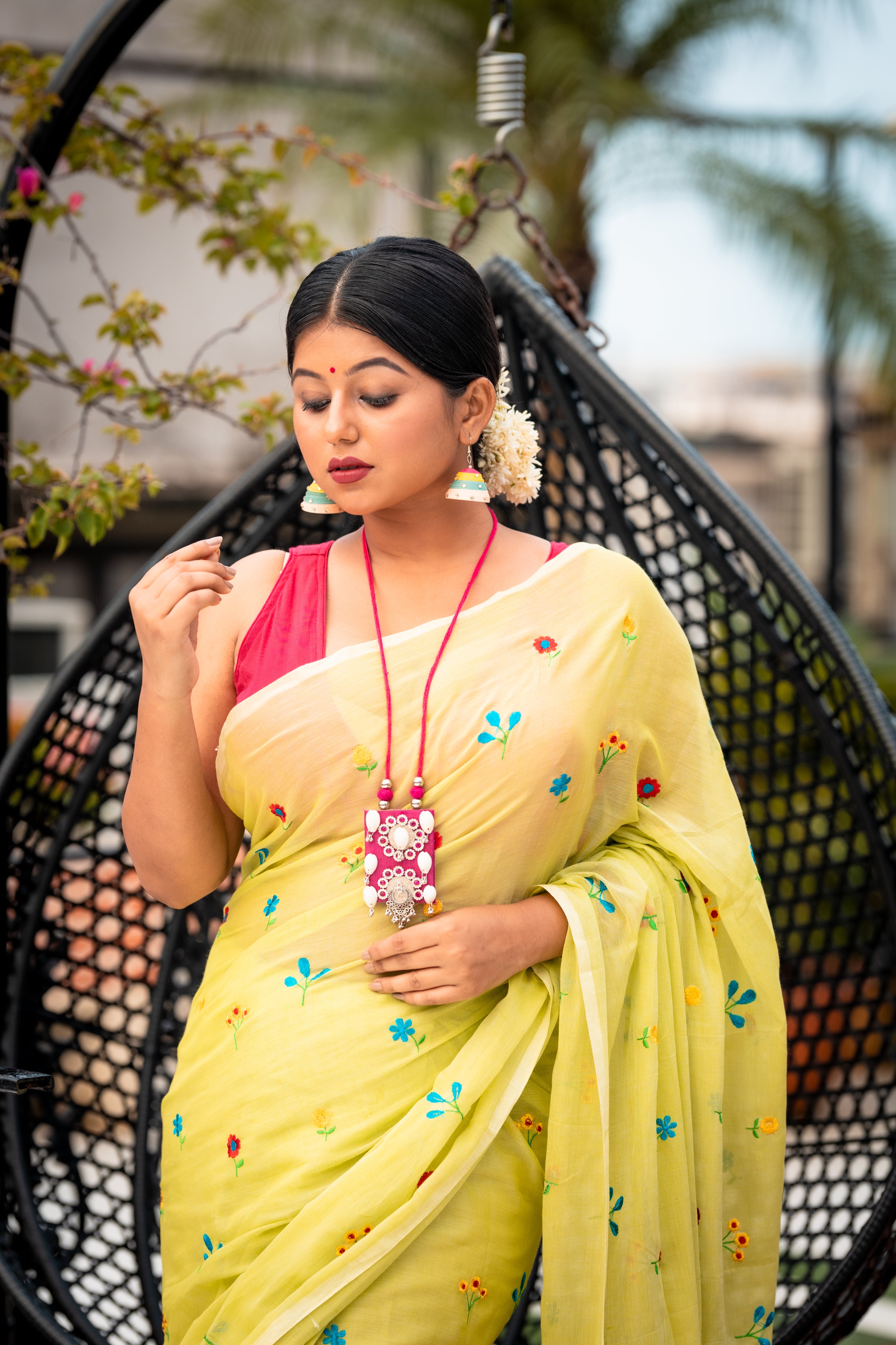 Poppins || Light Pista Green Mul Cotton Saree with all over Multi-colour Embroidered floral motifs