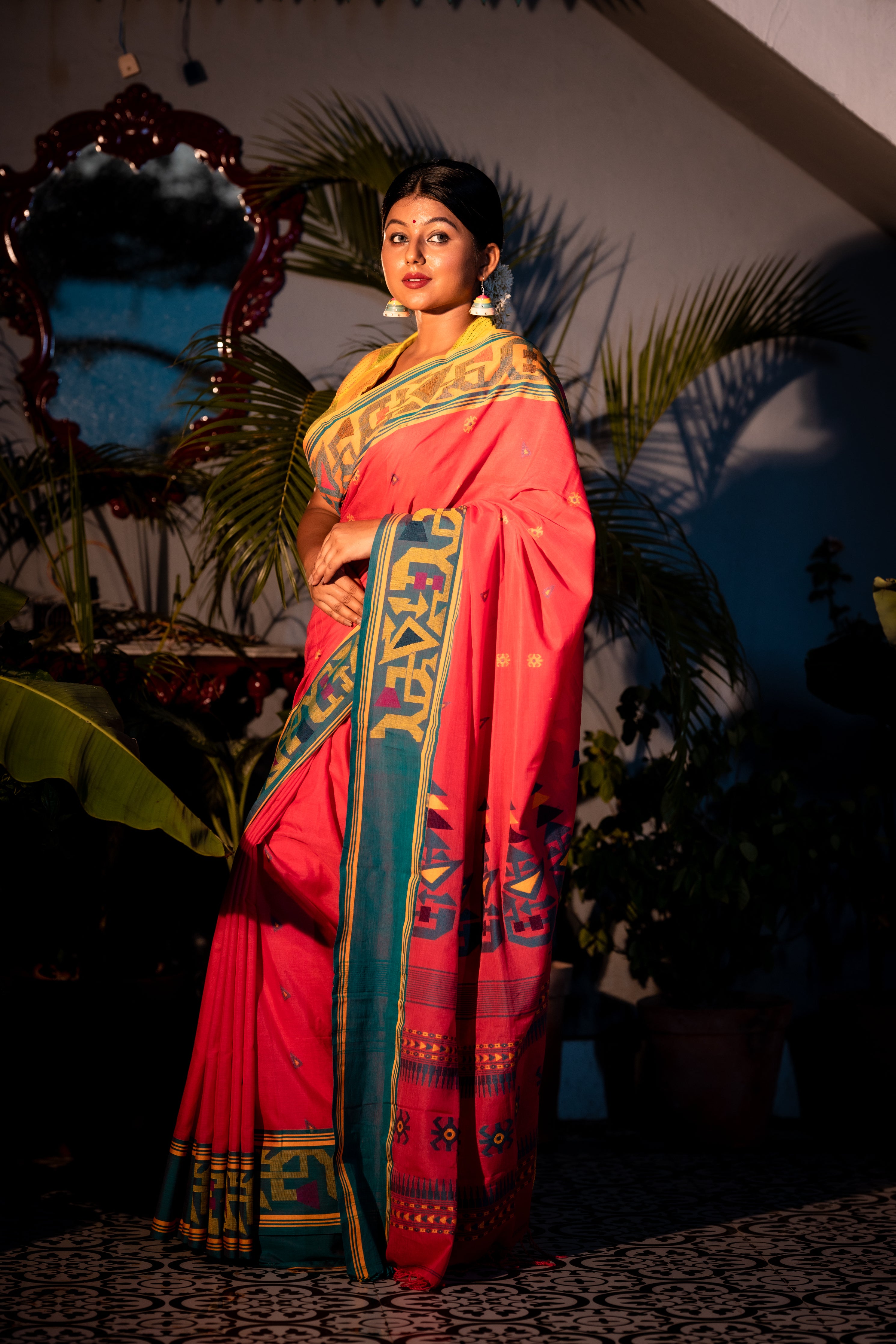 Godhuli || Raspberry Pink Cotton Bengal Handloom Saree with all over Multi-colour Buti, Mustard Yellow & Green 'Ganga Jamuna' Border and Traditional design Pallu
