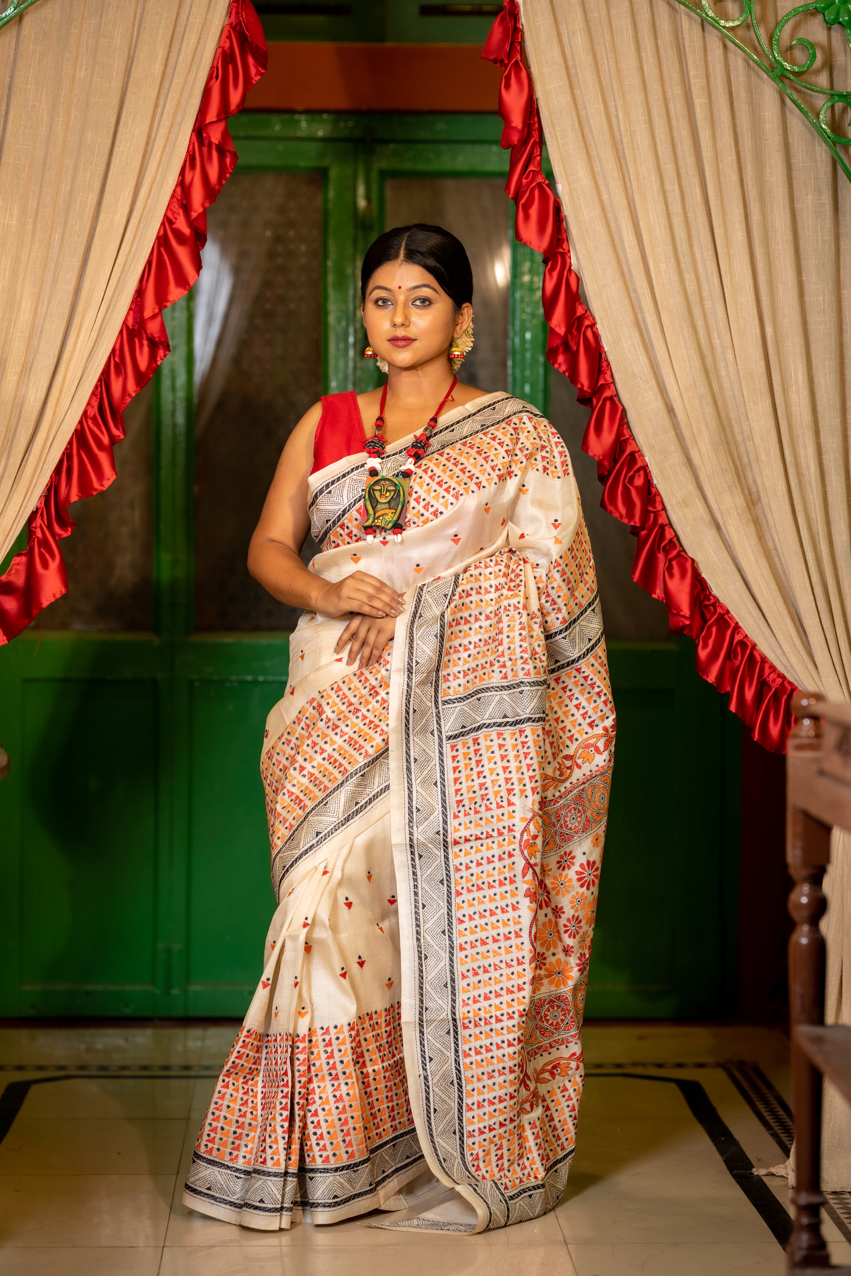 Ushoshi || Off-White Pure Tussar Silk Handloom Kantha Stitch Embroidery Saree with all over Orange, Red & Black Resham Buta, Broad Abstract Border and Floral motif Pallu