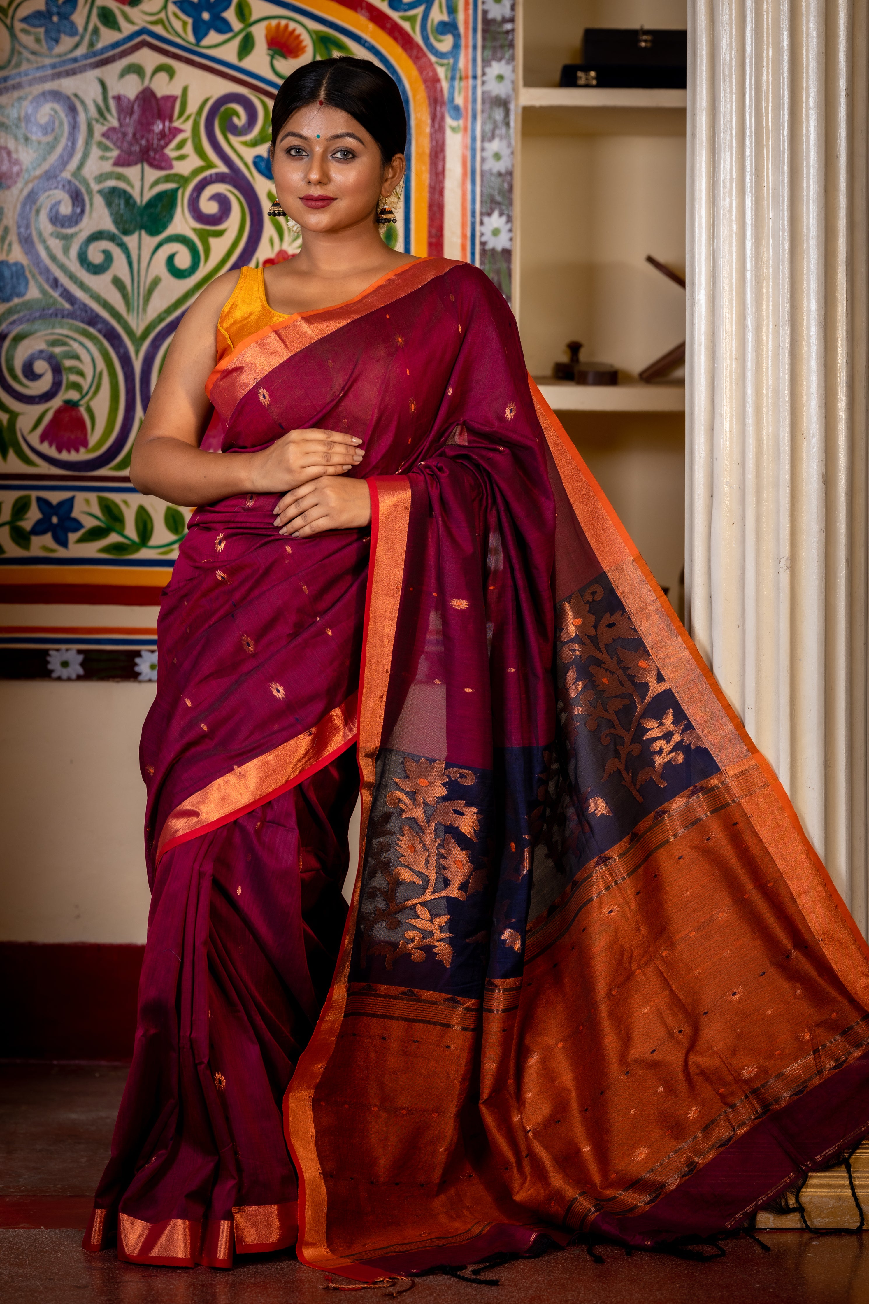 Jamuni || Wine Cotton Bengal Handloom Saree with all over Copper Zari & Multi-colour Buti, Navy Blue & Rust Orange Colour block with Copper Zari Floral motif Pallu and Plain Border