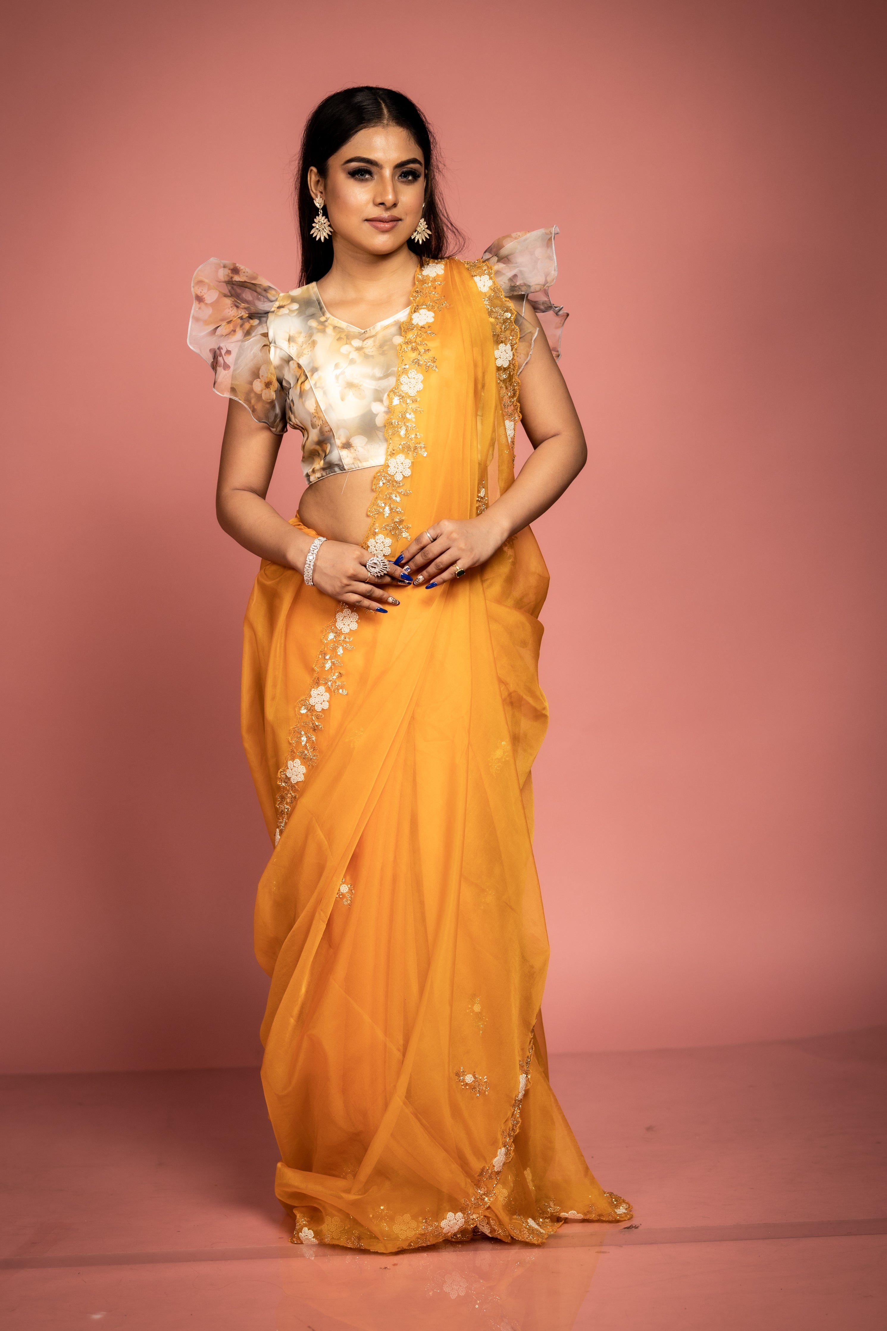 Kesariya || Saffron Soft Organza Fancy Saree with all over Antique Gold Cut-dana, Sequins & White Moti Handwork Floral motif Buta and Border