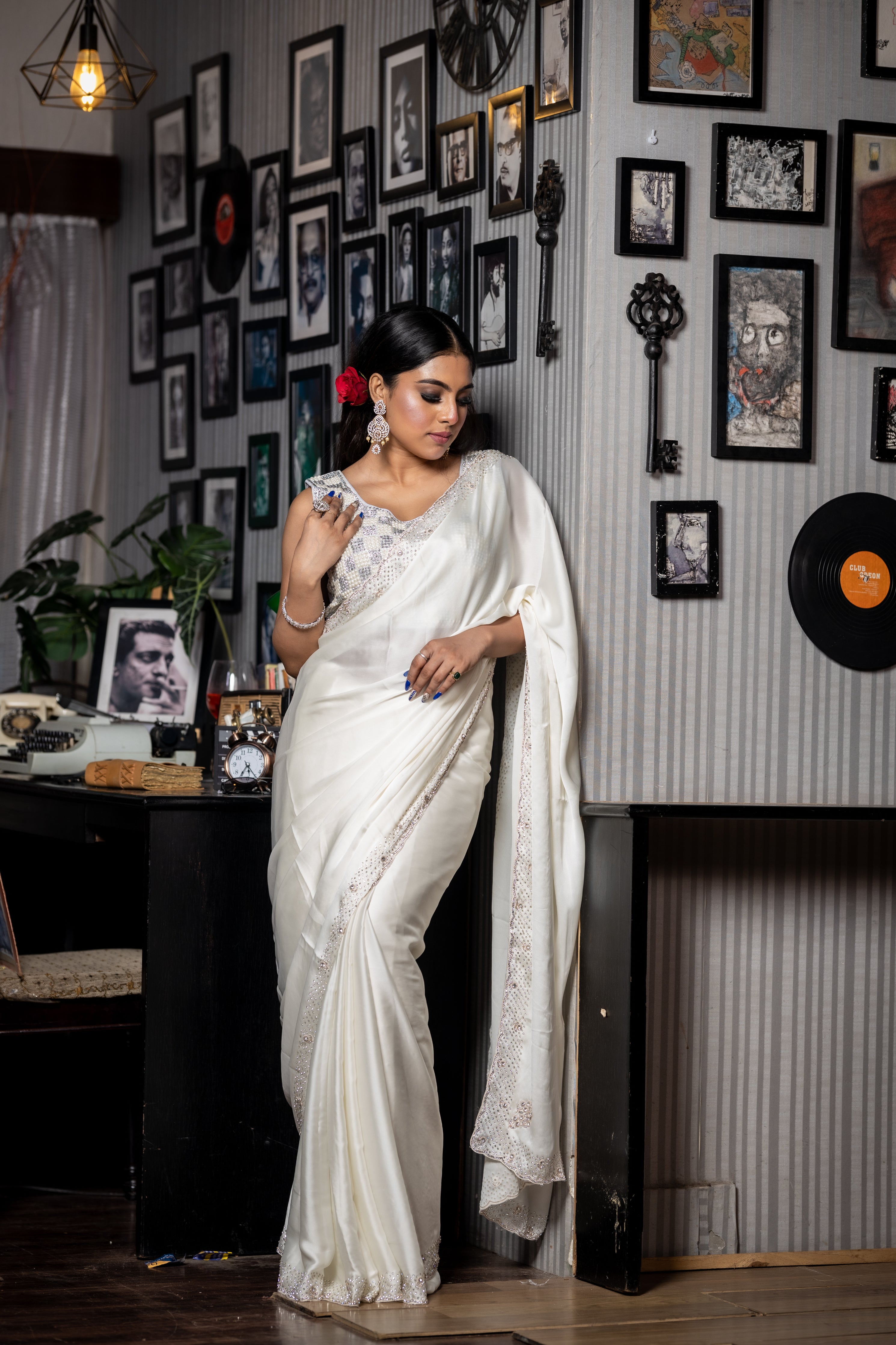Celestia || Pearl White Satin Crepe Fancy Saree with Plain Body and Sequins & Zardosi Handwork with Swarovski Embellishments