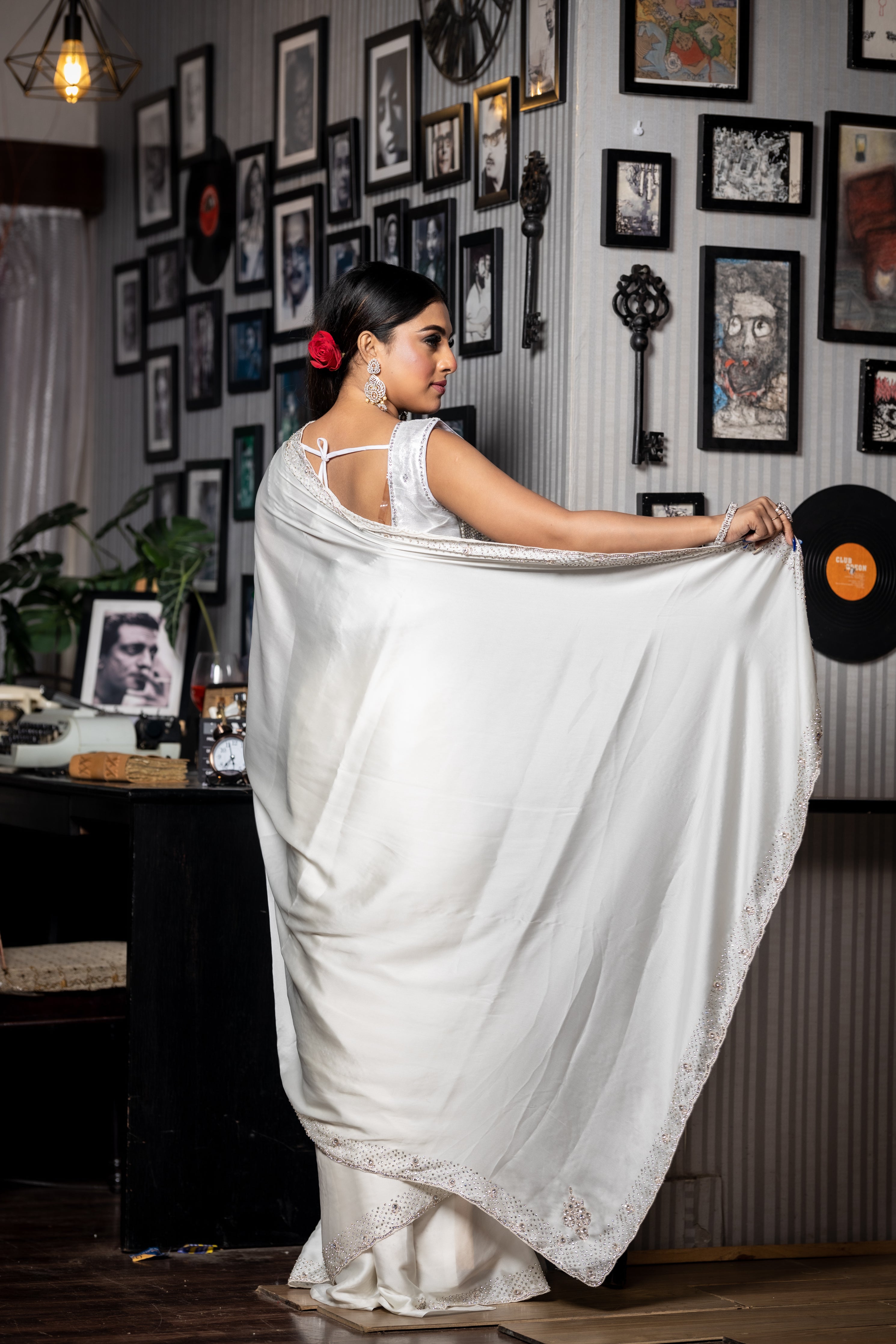 Celestia || Pearl White Satin Crepe Fancy Saree with Plain Body and Sequins & Zardosi Handwork with Swarovski Embellishments