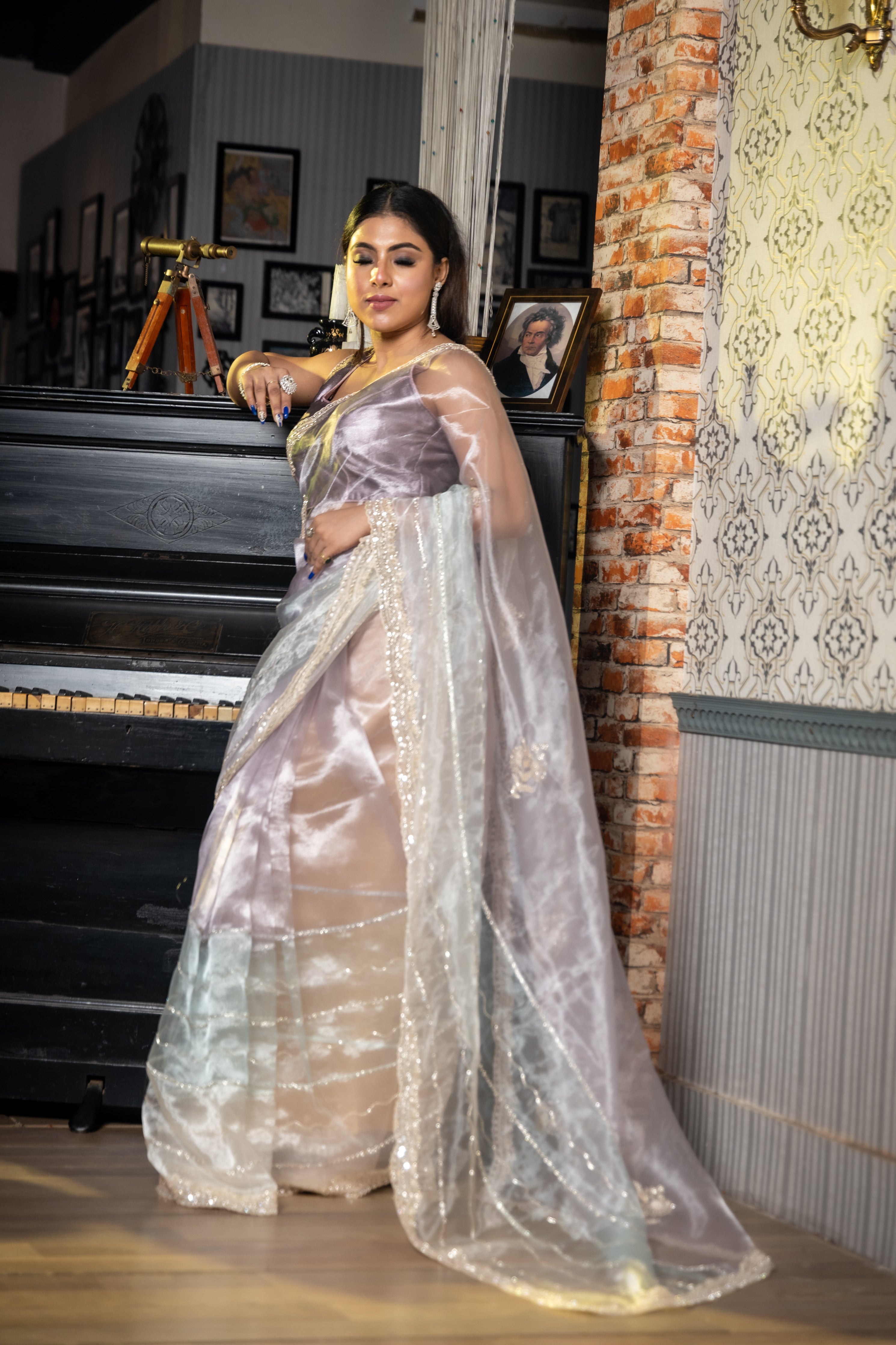 Diva || Lavender, Ice Blue & Off-White shaded Glass Tissue Fancy Saree with all over Sequins, Cut-dana, Moti & Stone Handwork Stripe and Border