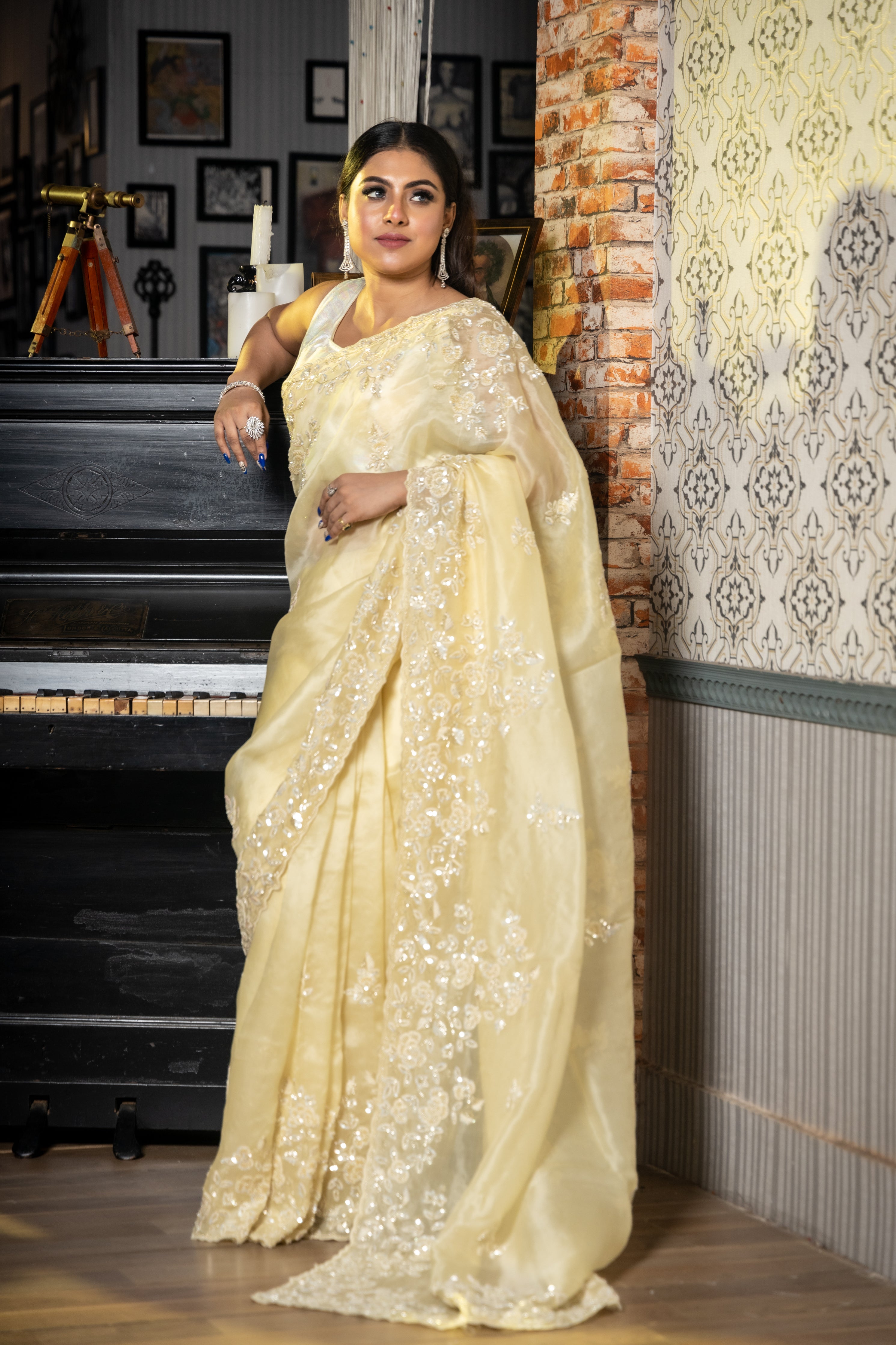 Celeste || Pastel Yellow Pure Organza Fancy Saree with all over Cut-dana Sequins Handwork Buti, Border & Pallu