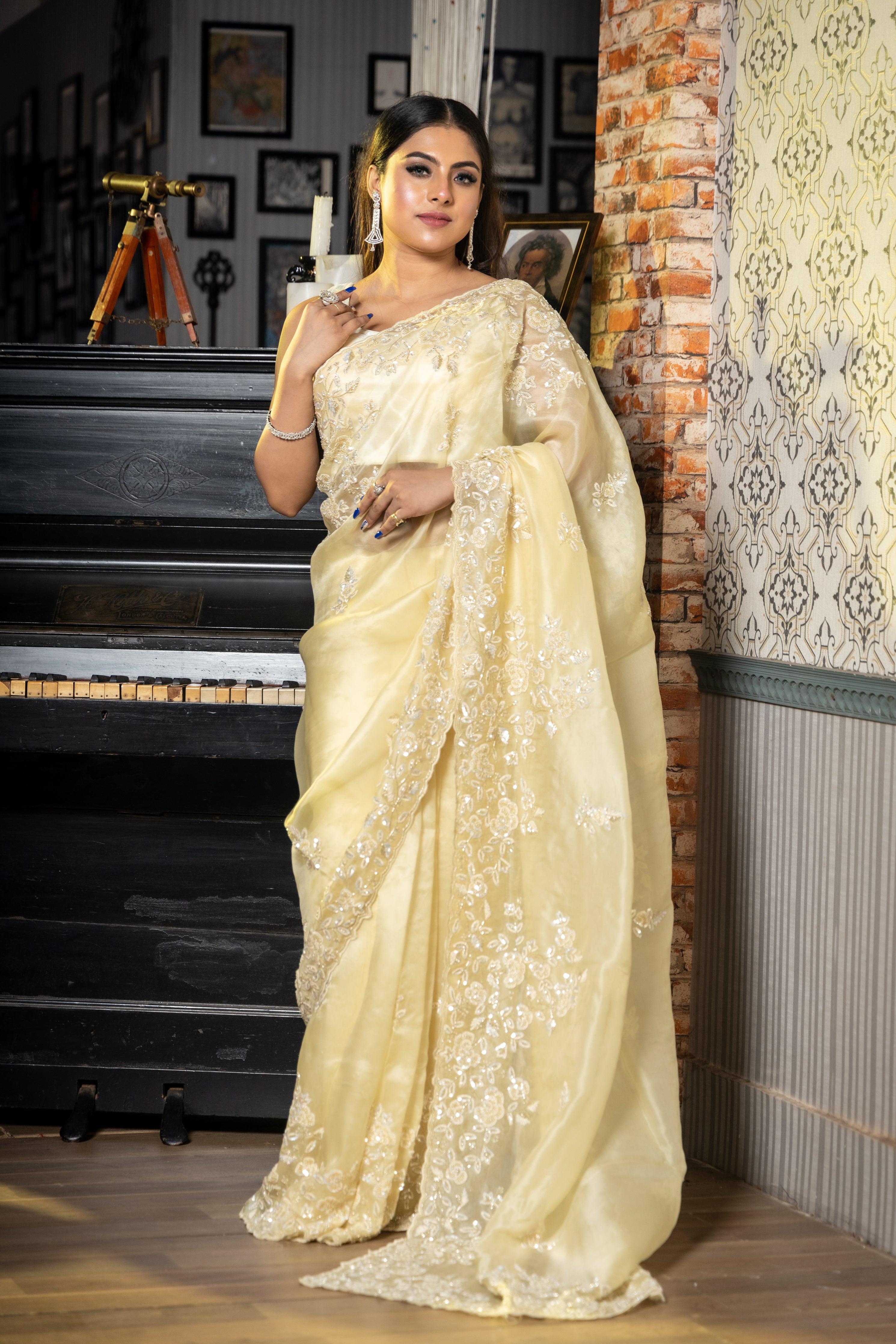 Celeste || Pastel Yellow Pure Organza Fancy Saree with all over Cut-dana Sequins Handwork Buti, Border & Pallu