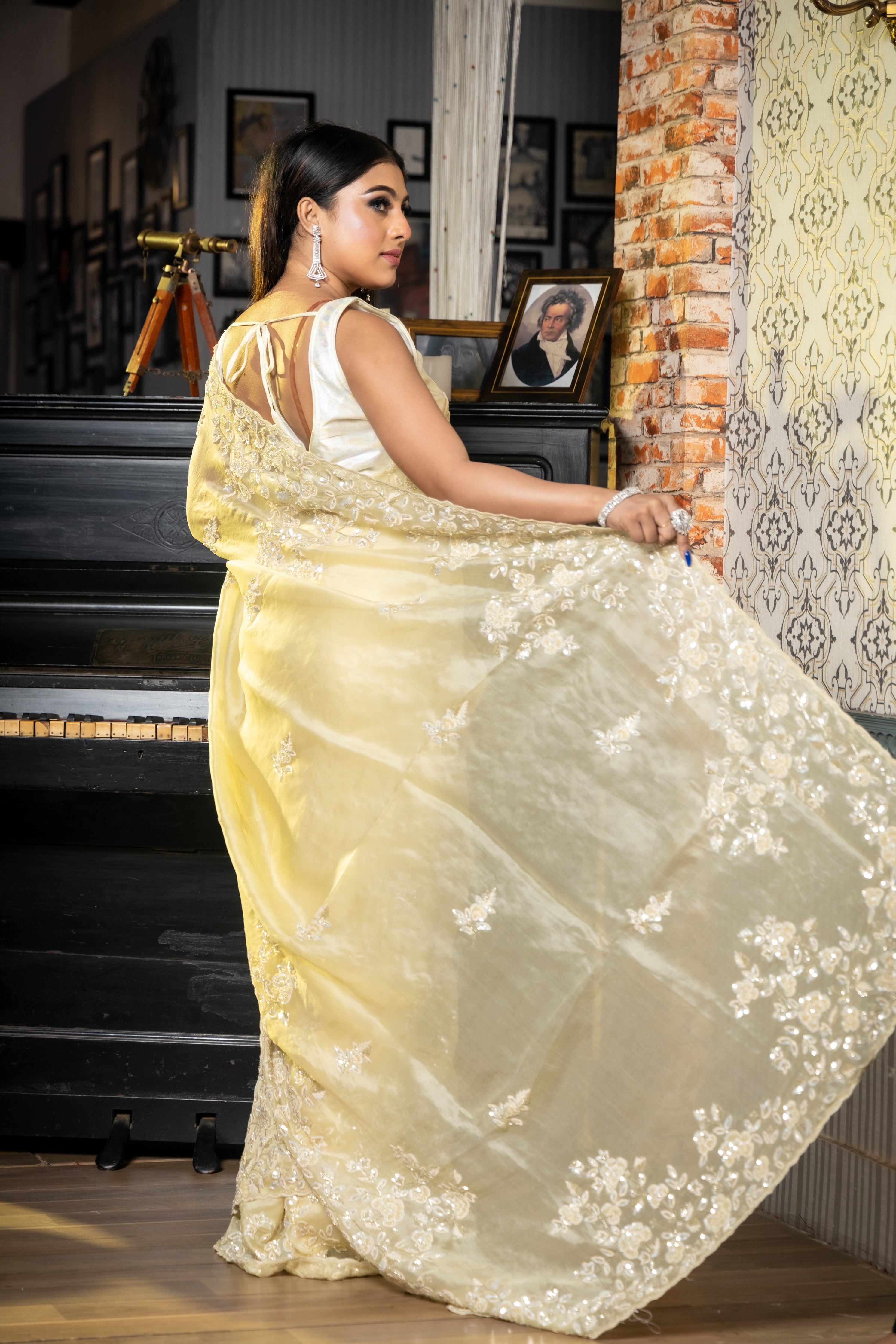 Celeste || Pastel Yellow Pure Organza Fancy Saree with all over Cut-dana Sequins Handwork Buti, Border & Pallu