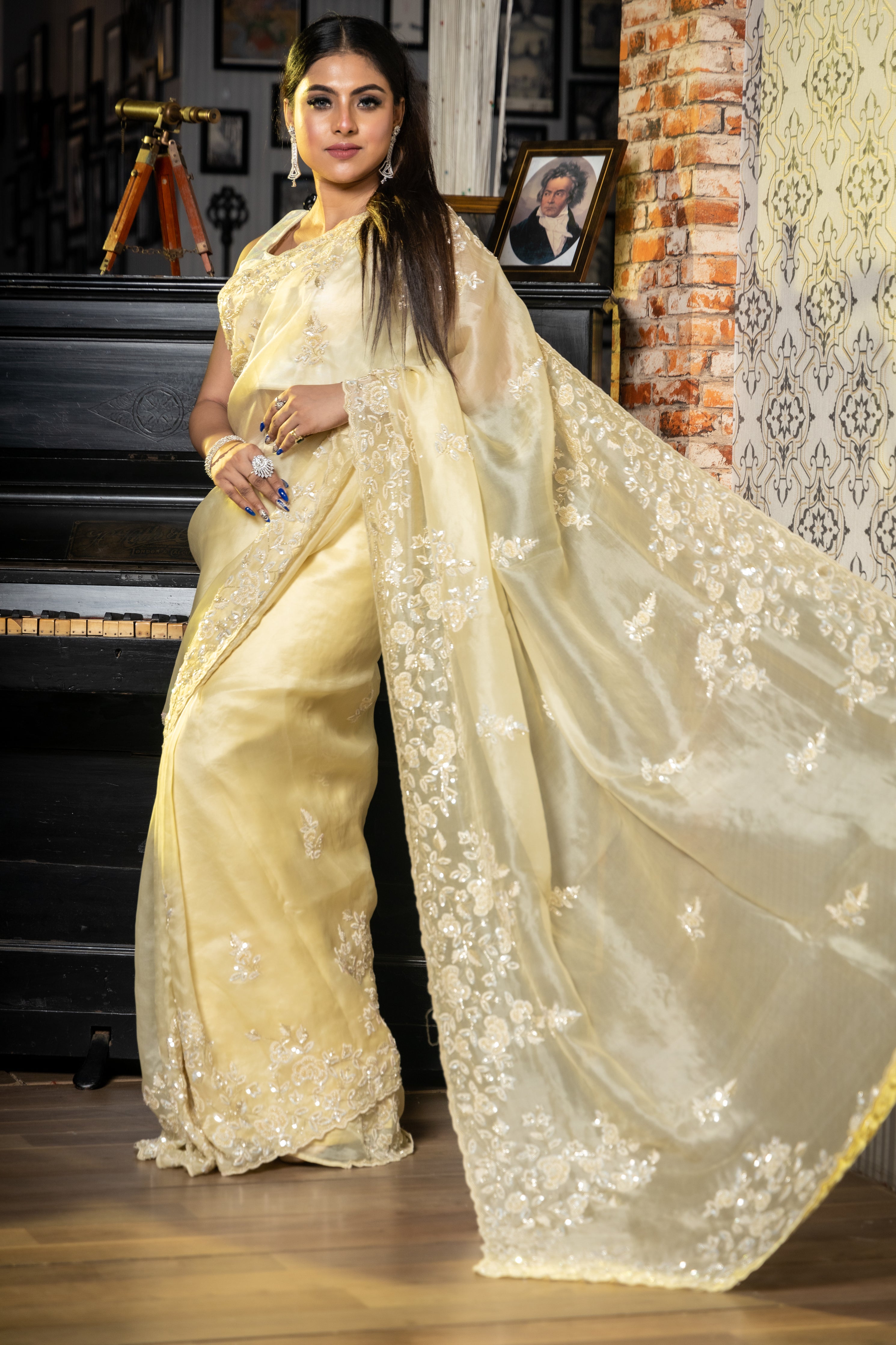 Celeste || Pastel Yellow Pure Organza Fancy Saree with all over Cut-dana Sequins Handwork Buti, Border & Pallu