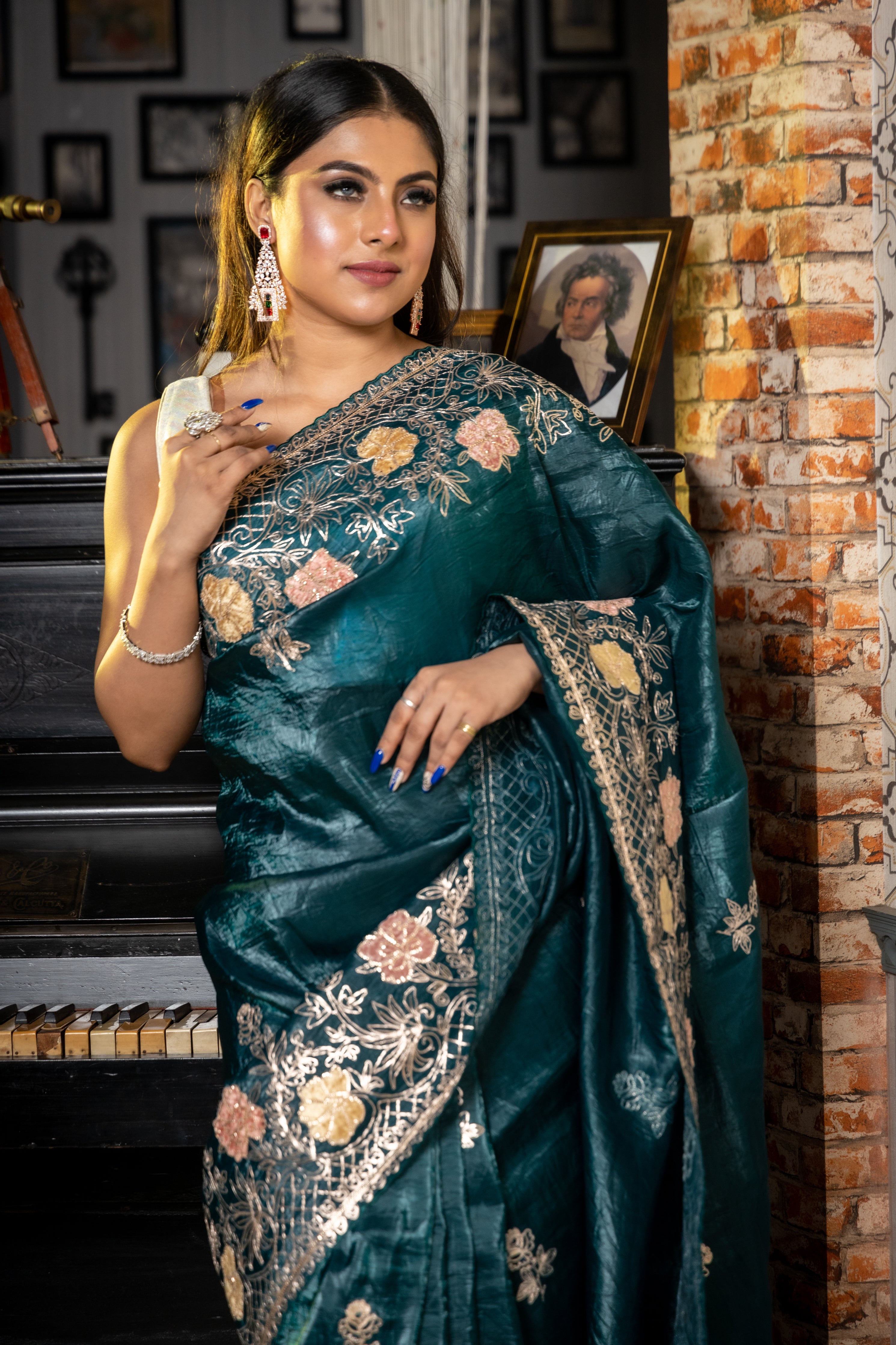 Aurora || Dark Metallic Ocean Green & Black dual tone Crushed Soft Tissue Fancy Saree with all over Pitta Zari Handwork Floral Buta and Multi-colour Applique & Pitta Zari Floral Jaal Border