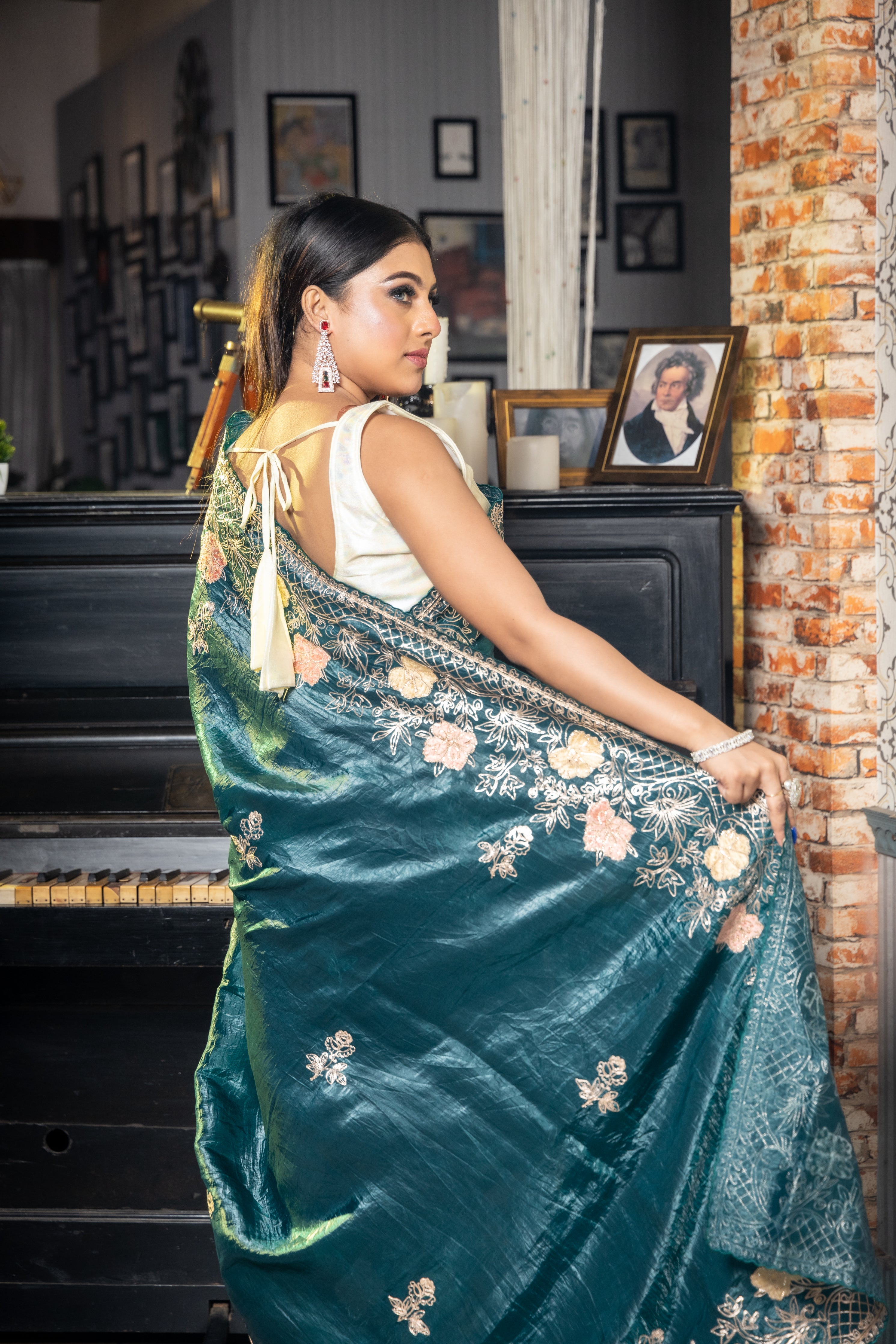 Aurora || Dark Metallic Ocean Green & Black dual tone Crushed Soft Tissue Fancy Saree with all over Pitta Zari Handwork Floral Buta and Multi-colour Applique & Pitta Zari Floral Jaal Border