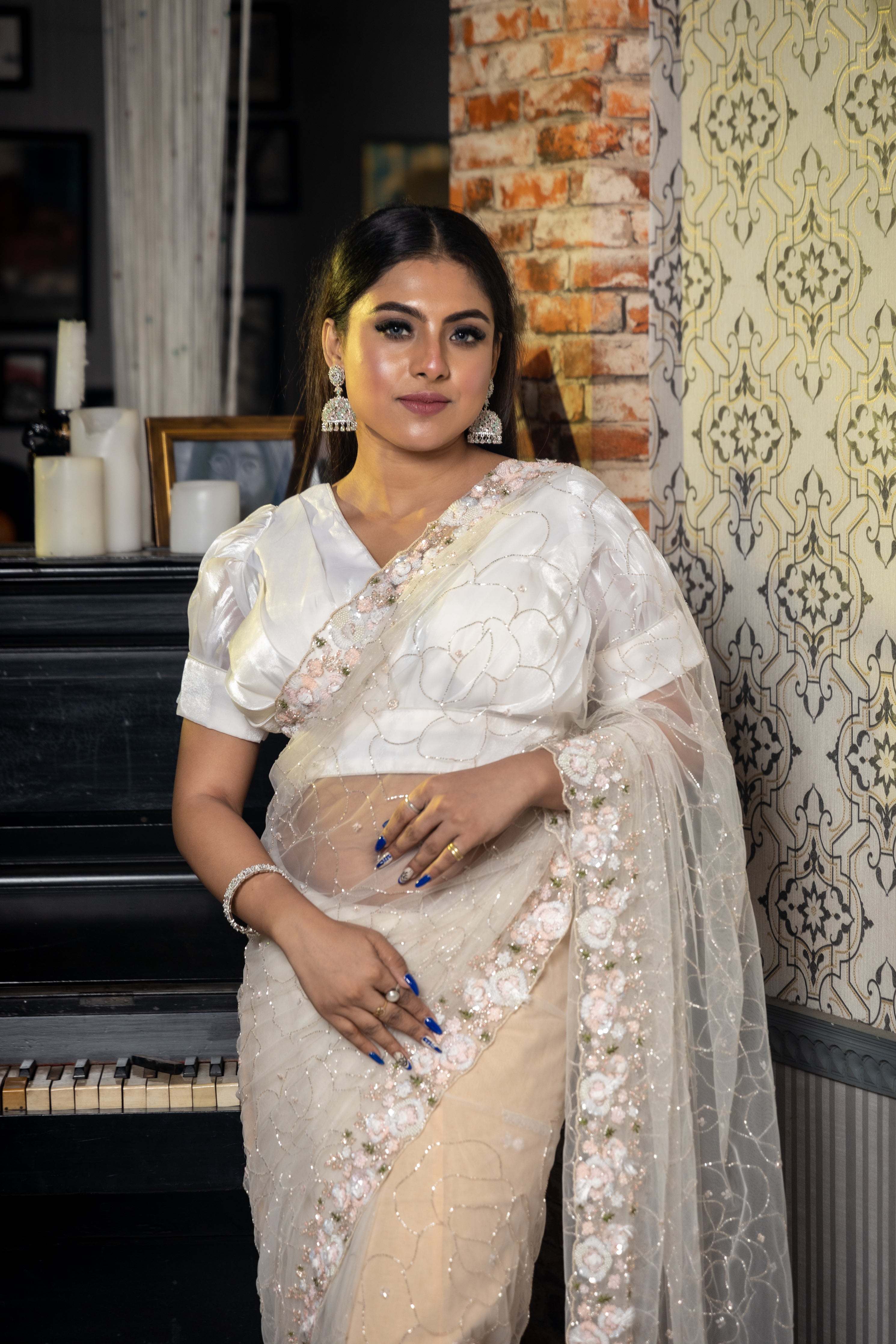 Showstopper || Off-White Net Fancy Saree with all over Cut-dana Jaal body, Sequins & Cut-dana Buti and Multi-colour Sequins, Moti & Cut-dana Handwork Floral Border with Resham highlights