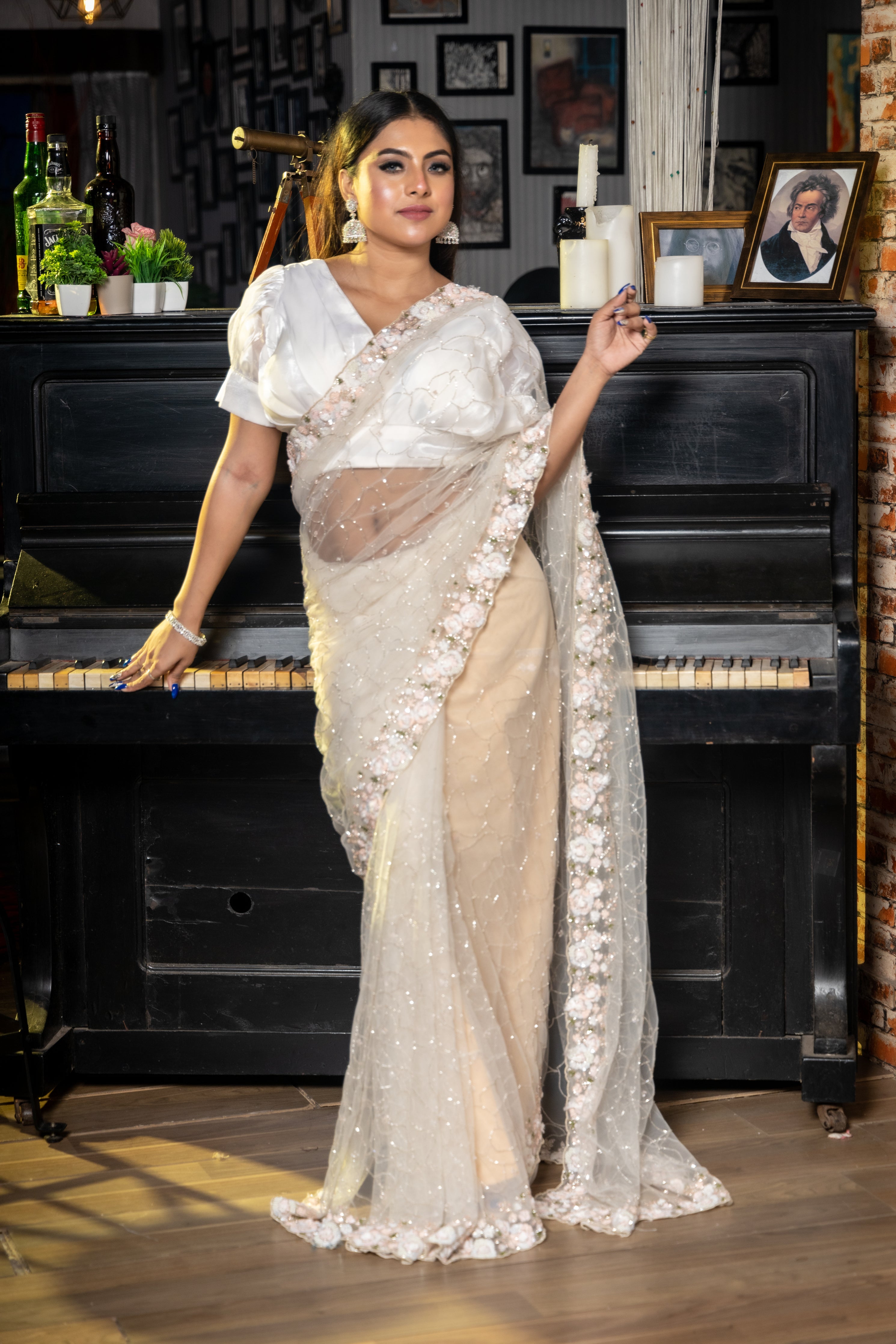 Showstopper || Off-White Net Fancy Saree with all over Cut-dana Jaal body, Sequins & Cut-dana Buti and Multi-colour Sequins, Moti & Cut-dana Handwork Floral Border with Resham highlights