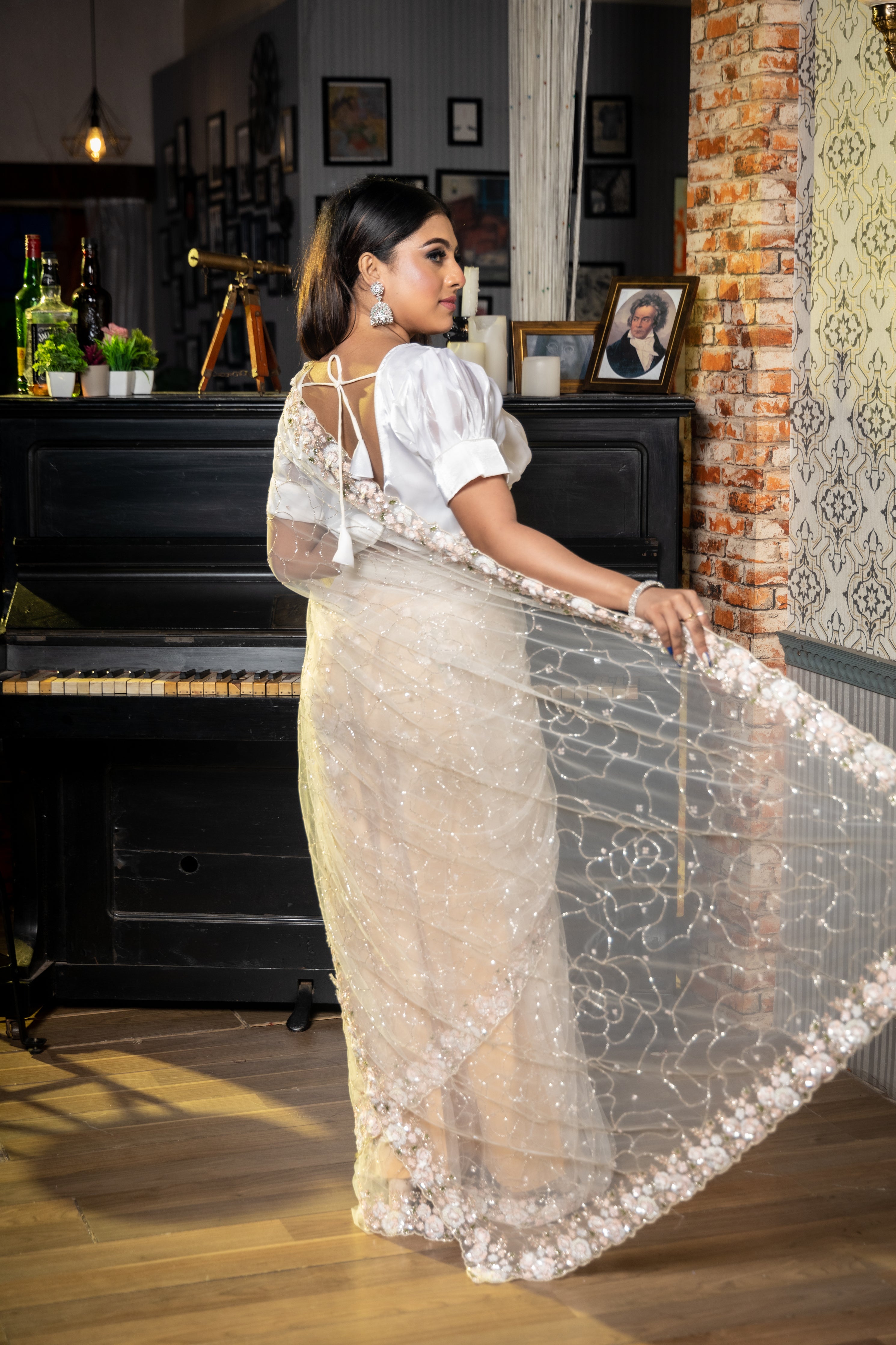 Showstopper || Off-White Net Fancy Saree with all over Cut-dana Jaal body, Sequins & Cut-dana Buti and Multi-colour Sequins, Moti & Cut-dana Handwork Floral Border with Resham highlights