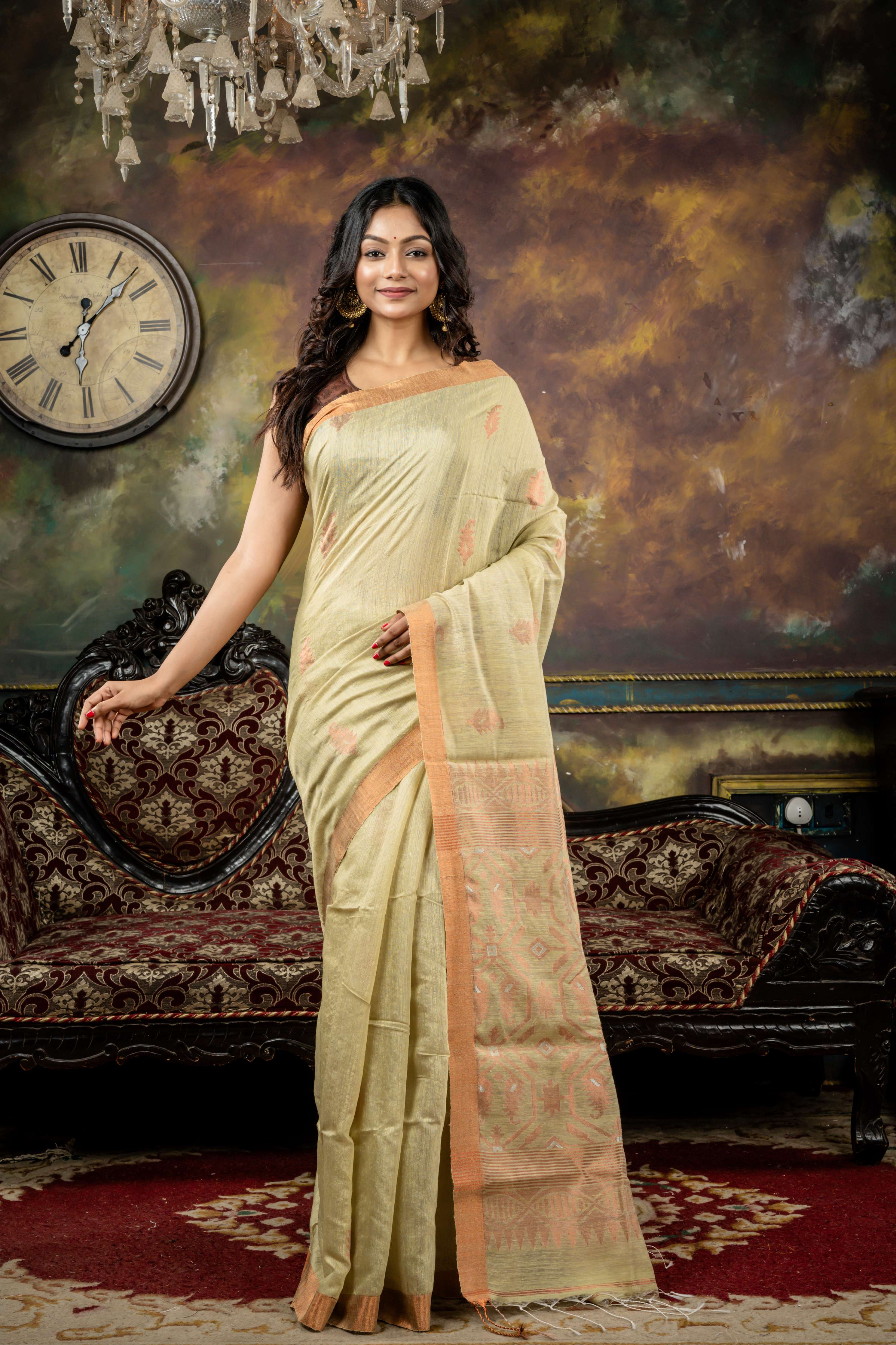 Giribala || Light Pista Green Matka Bengal Handloom Saree with all over Copper Zari Buta and 'Karat motif Pallu with Silver Zari highlights