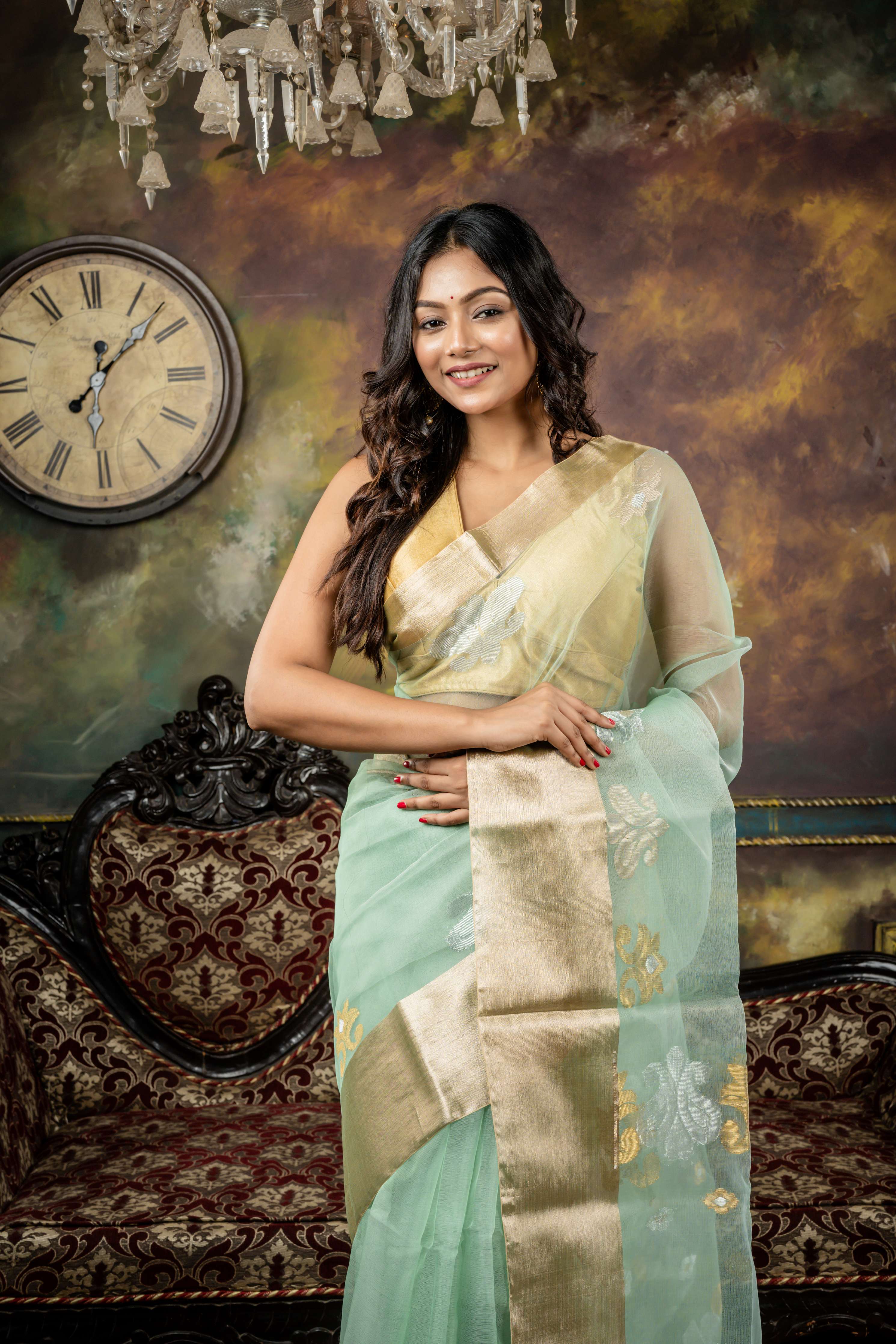 Mohona || Sea Green Muslin Bengal Handloom Saree with all over Golden, Silver & Matte Gold Zari Traditional Buta, Matte Gold Zari 'Mahapadh' Border and Traditional motif Pallu