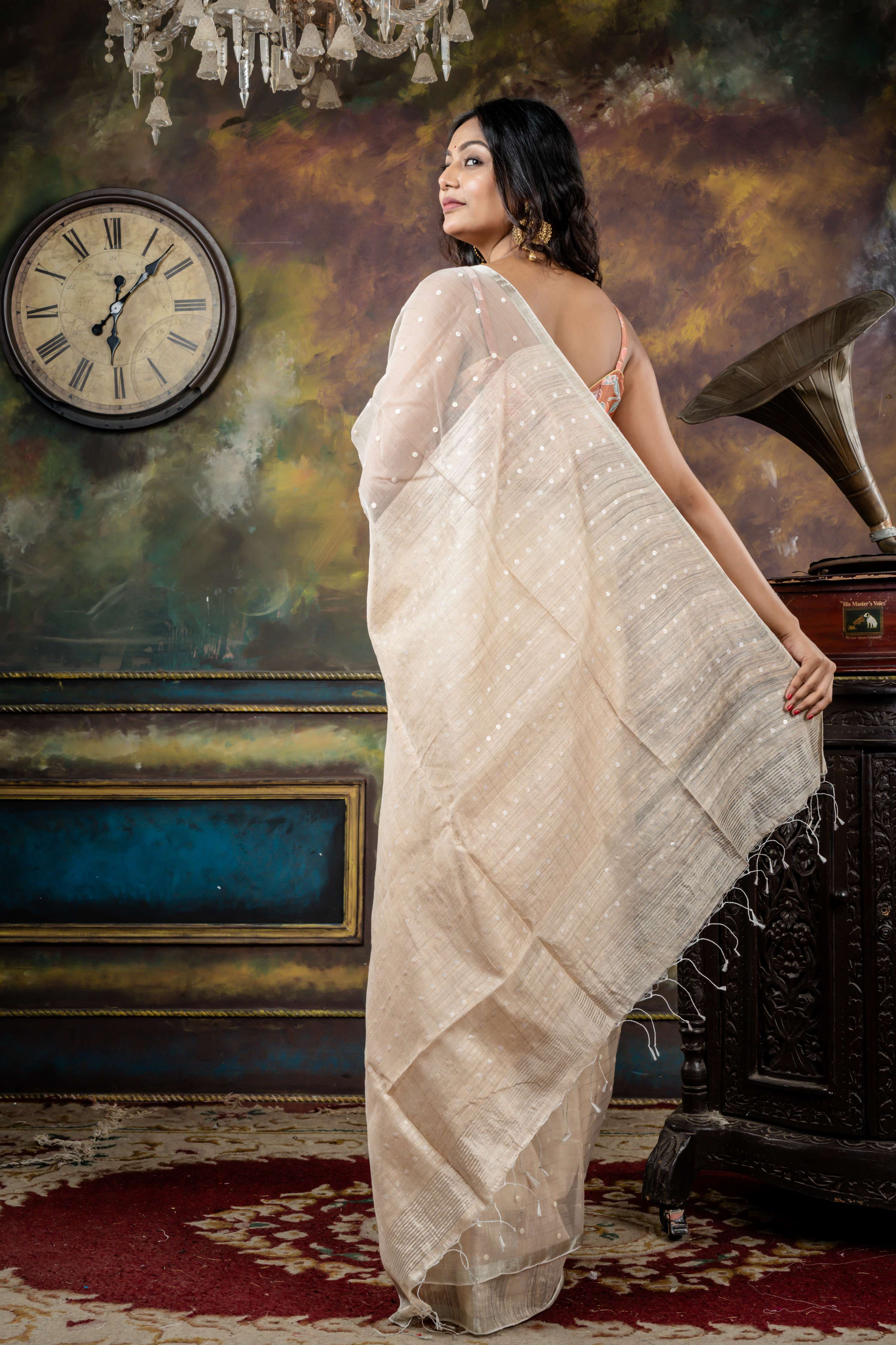 Ektara || Pearl White Half Matka & Half Muslin Bengal Handloom Saree with Half Body Plain, woven Sea Shell buttons with Silver Zari Stripes Half Body & Pallu and Silver Zari Border