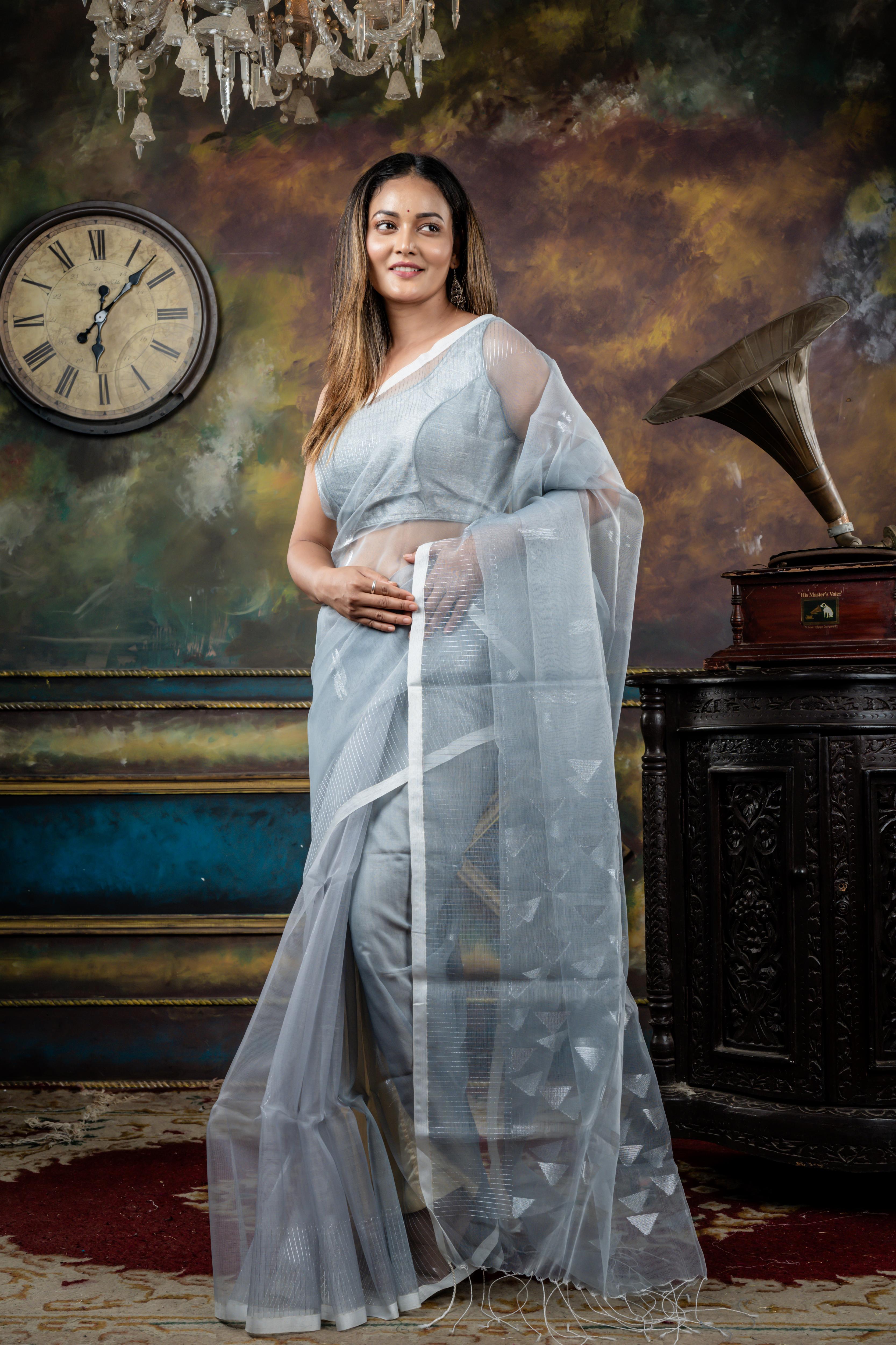 Jyotsna || Grey Muslin Saree with all over Silver Zari Abstract Buta, Stripe Border and 'Temple' motif Pallu