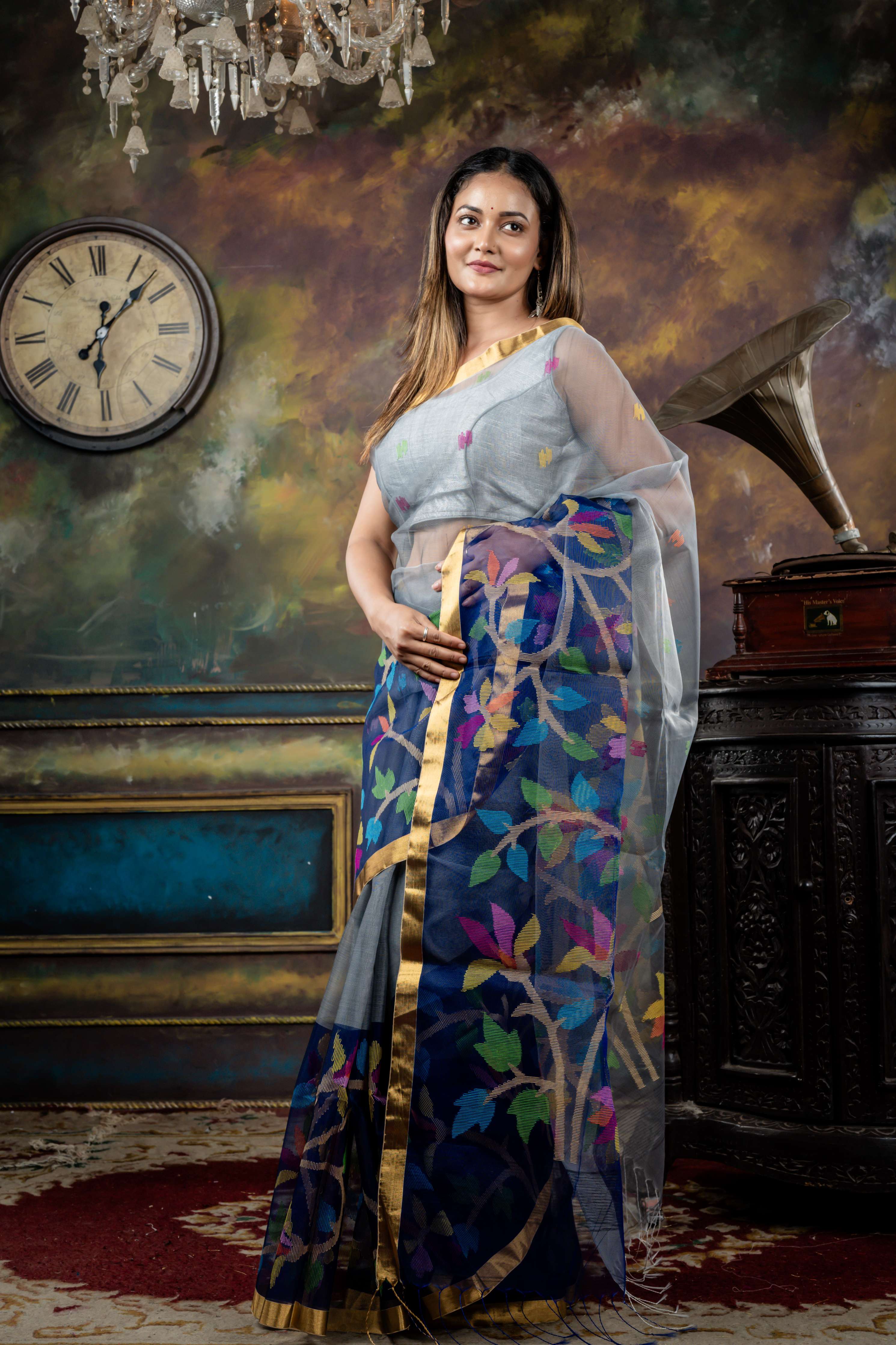 Sulata || Smokey Grey Premium Muslin Bengal Handloom Saree with all over Multi-colour Jamdani Buta and Midnight Blue Floral Jamdani 'Mahapadh'  Border & Pallu