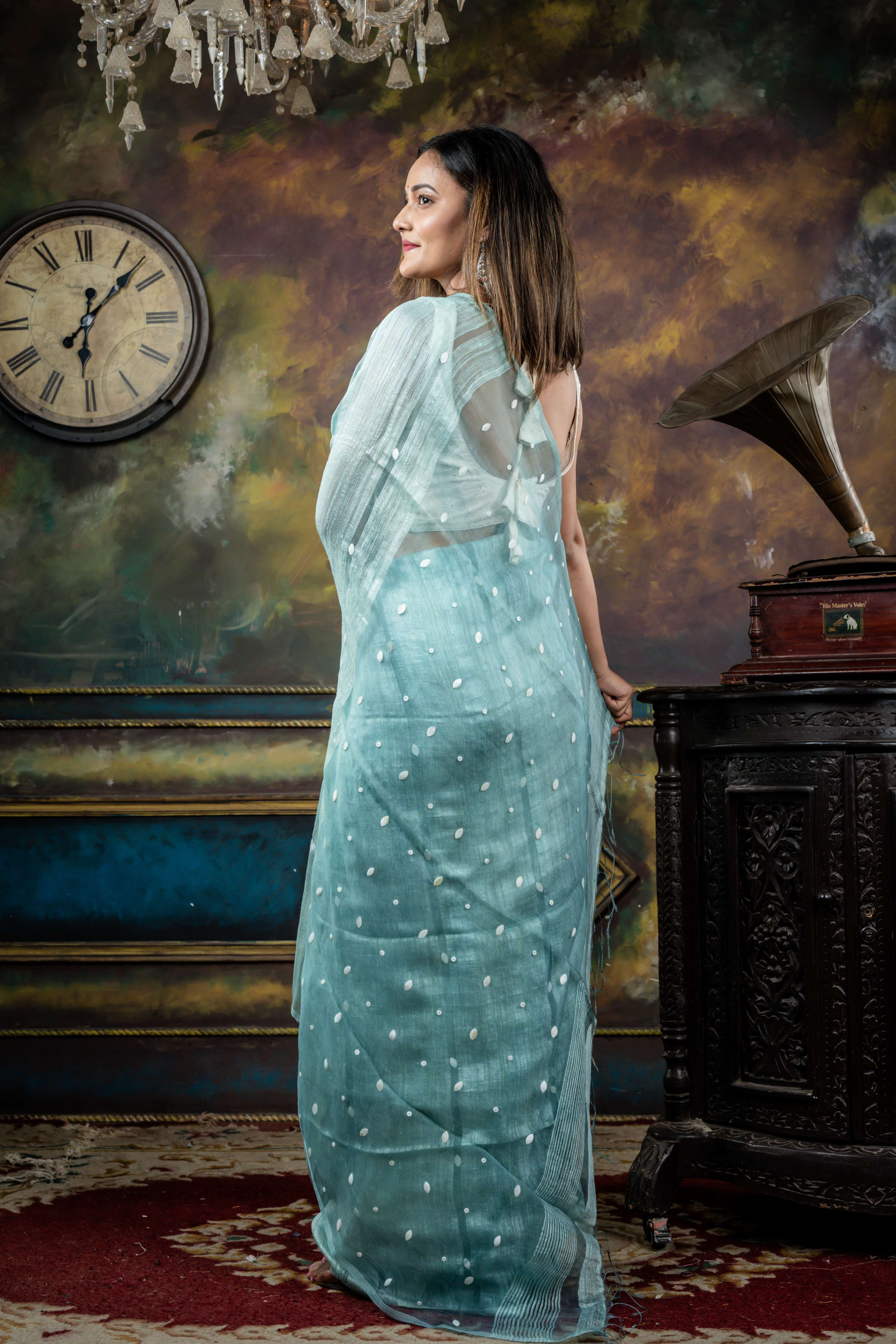 Trishna || Ice Blue Matka Bengal Handloom Saree with Half Body Plain, Half Body woven Sea Shell highlights on Muslin block Stripes and Sea Shell embellished Muslin Pallu