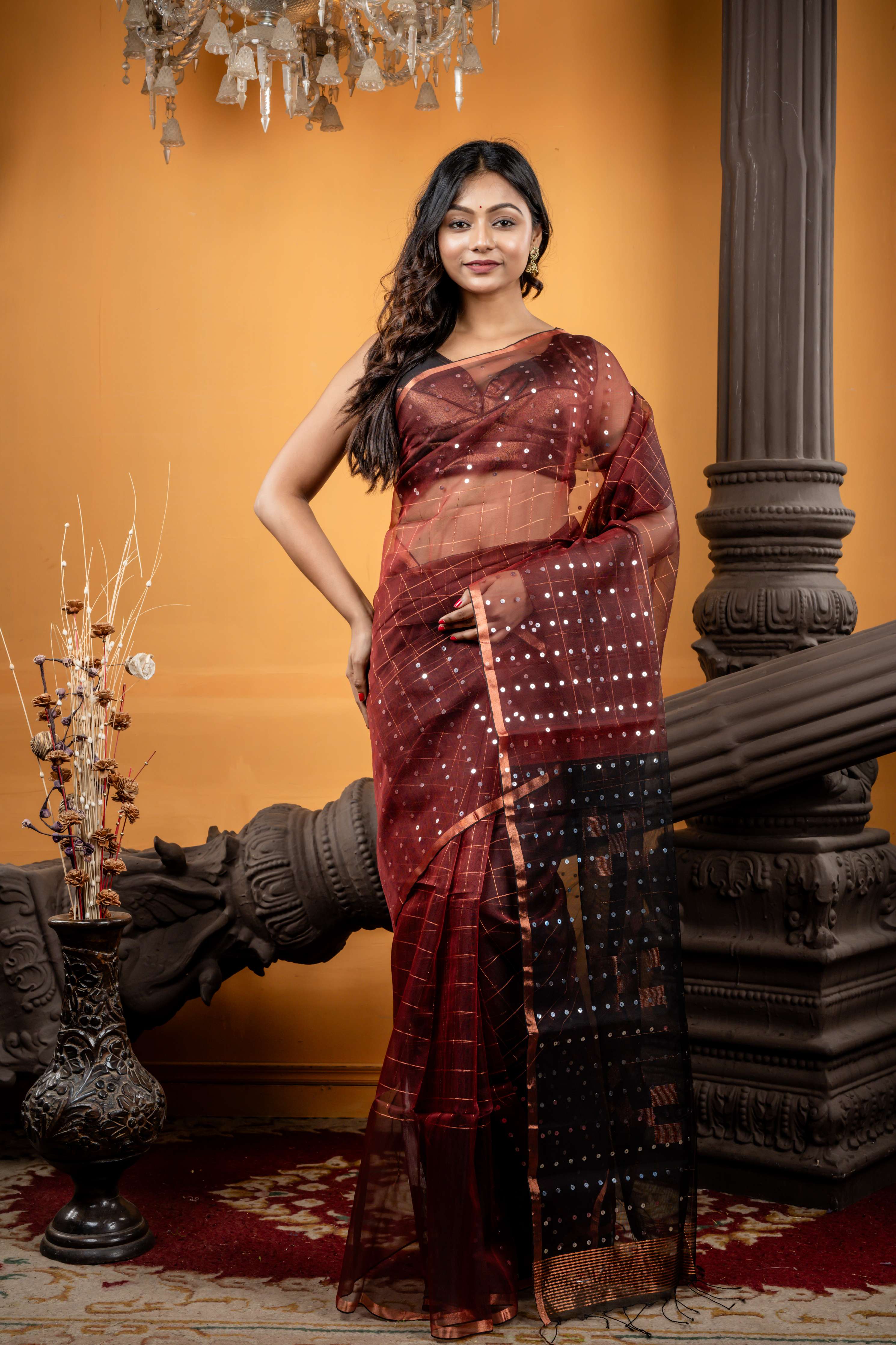 Jhilmil || Rosewood Brown Muslin Bengal Handloom Saree with all over Copper Checks, half body Sequins highlights, half body Plain Black Border and Copper Checks with Sequins highlights Pallu