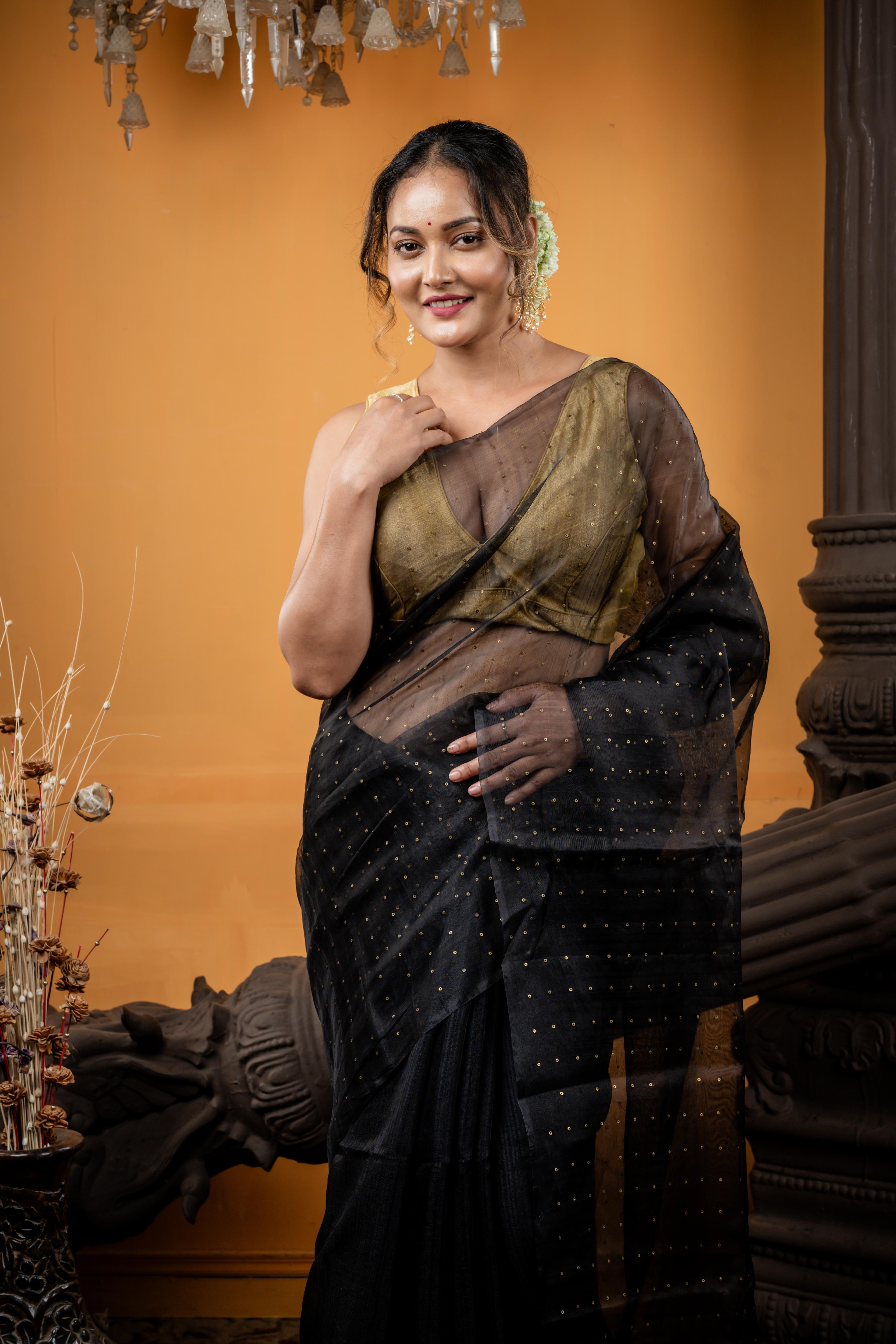 Jonaki || Black Premium 'Matka-Muslin' half & half Bengal Handloom Saree with Plain Half Body and woven Antique Gold Small Sequins Half Body & Pallu