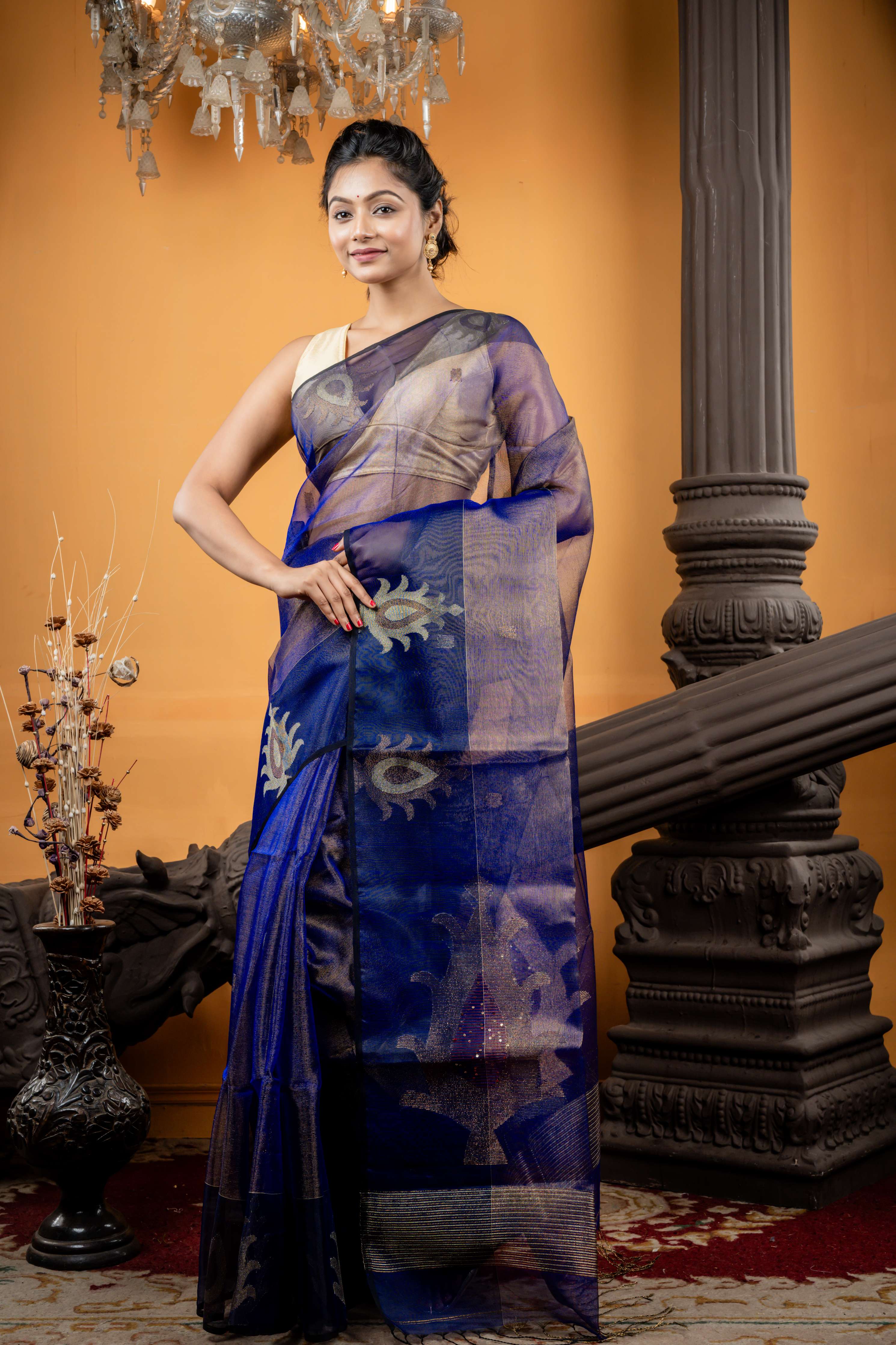 Neelanjana || Royal Blue & Black dual tone Premium Muslin Bengal Handloom Saree with all over Gold & Copper Zari Buta and Traditional motif Border & Pallu with Sequins highlights