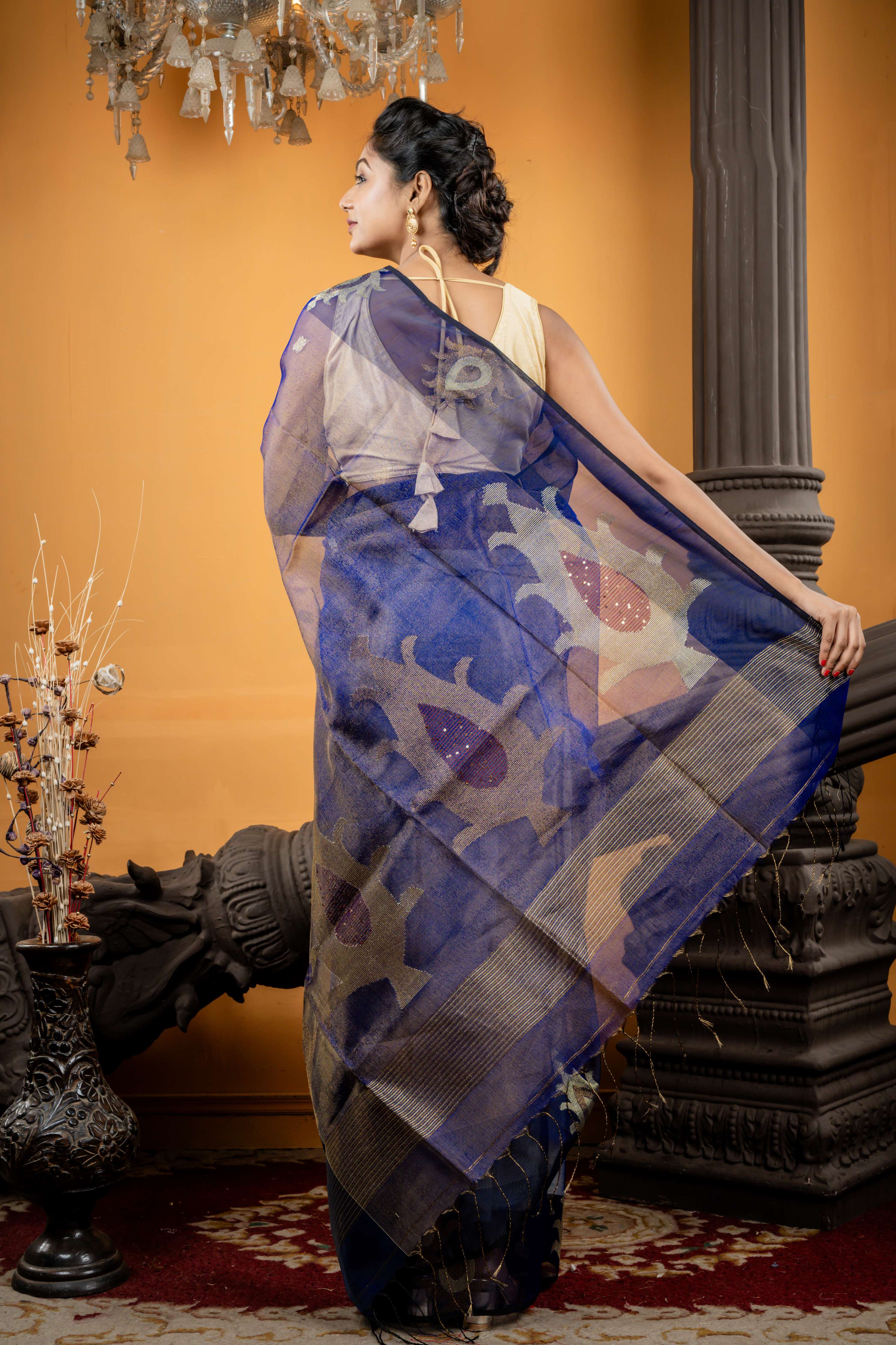 Neelanjana || Royal Blue & Black dual tone Premium Muslin Bengal Handloom Saree with all over Gold & Copper Zari Buta and Traditional motif Border & Pallu with Sequins highlights