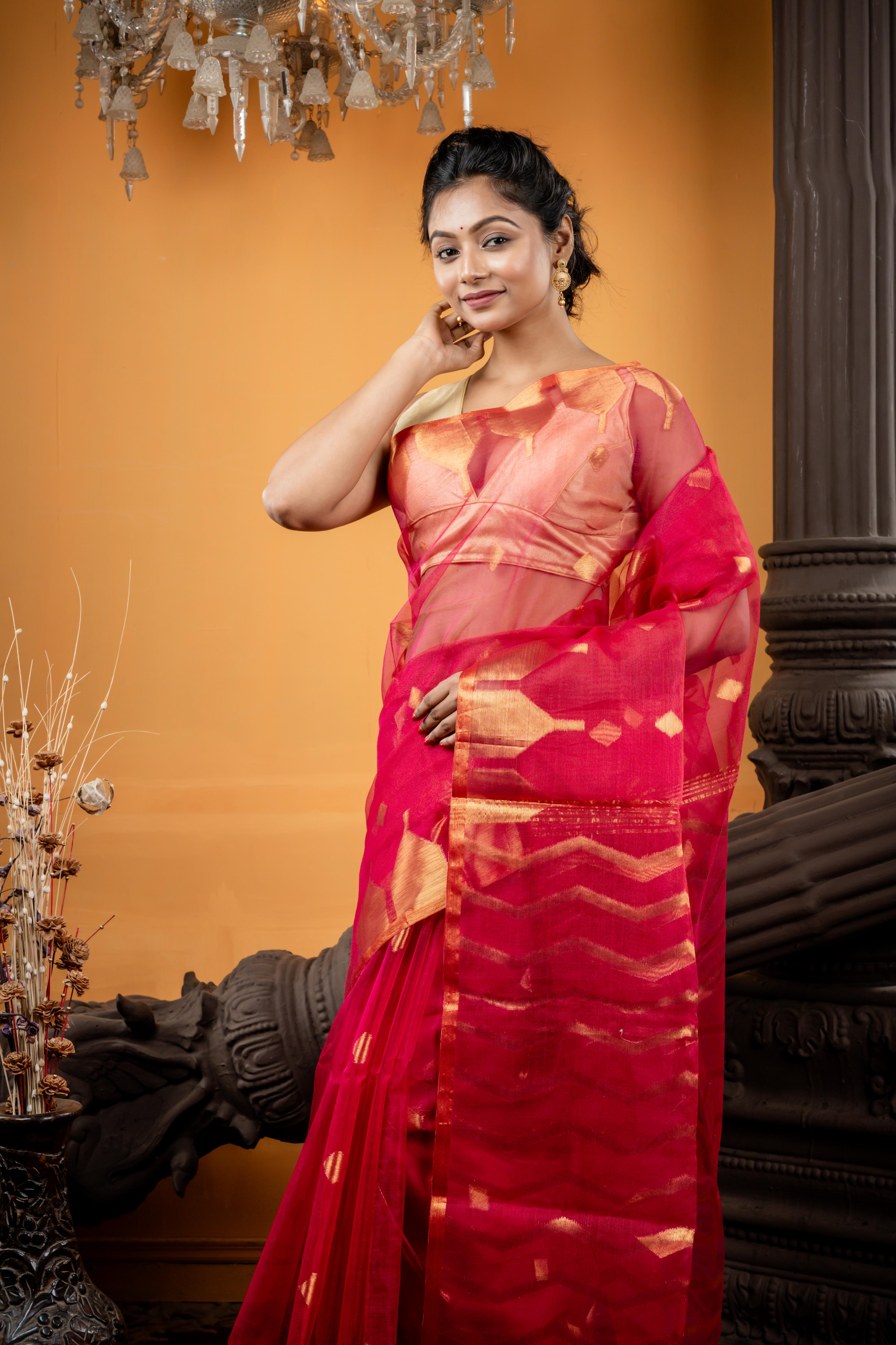 Nabarupa || Magenta Pink Muslin Saree with all over Golden Zari Abstract Buta, ZigZag Stripe Pallu and Sleek Border with 'Temple' motifs