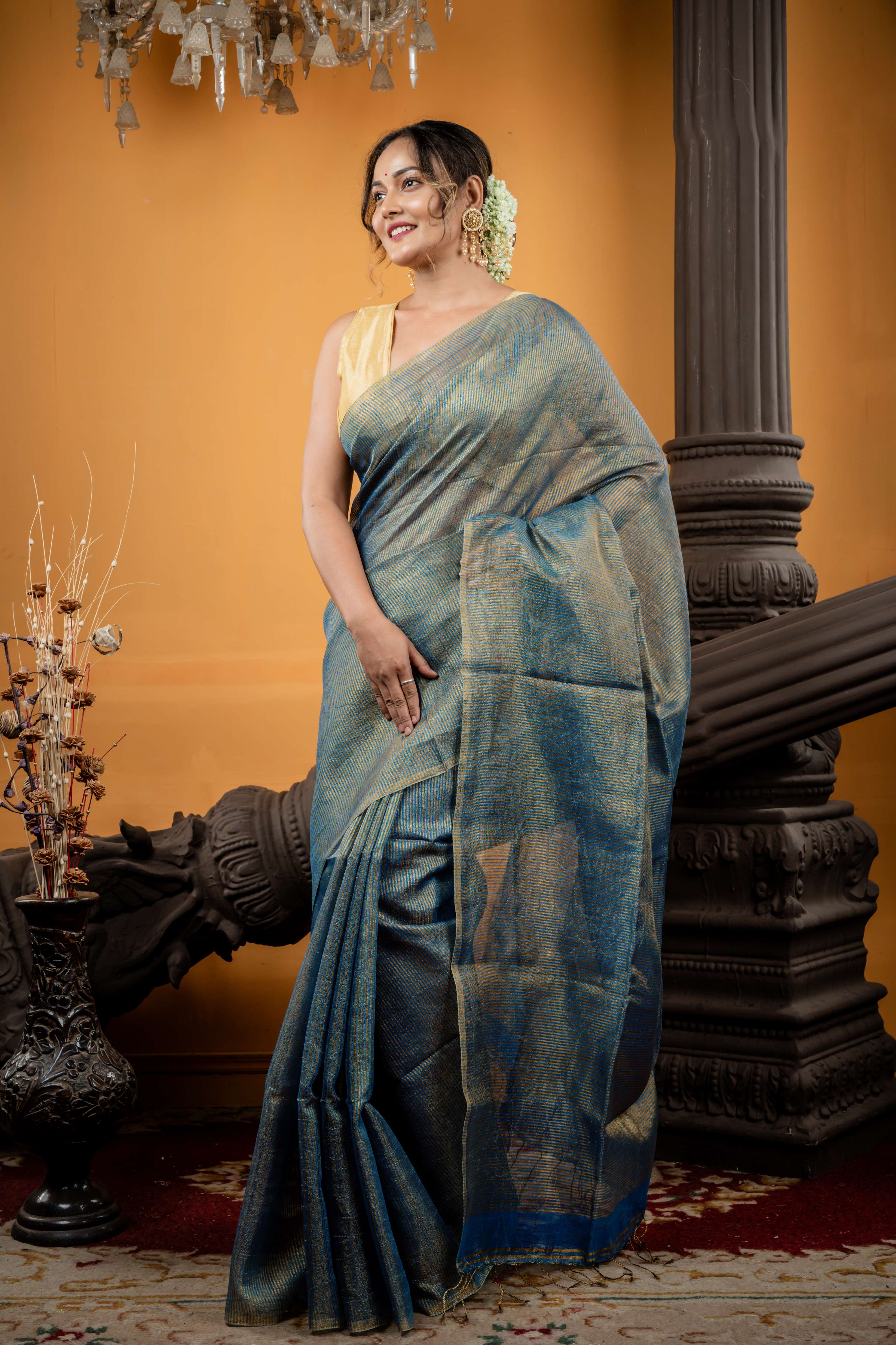 Kaushiki || Dusty Blue Metallic Linen Bengal Handloom Saree with all over Antique Gold Stripes and Sleek Border