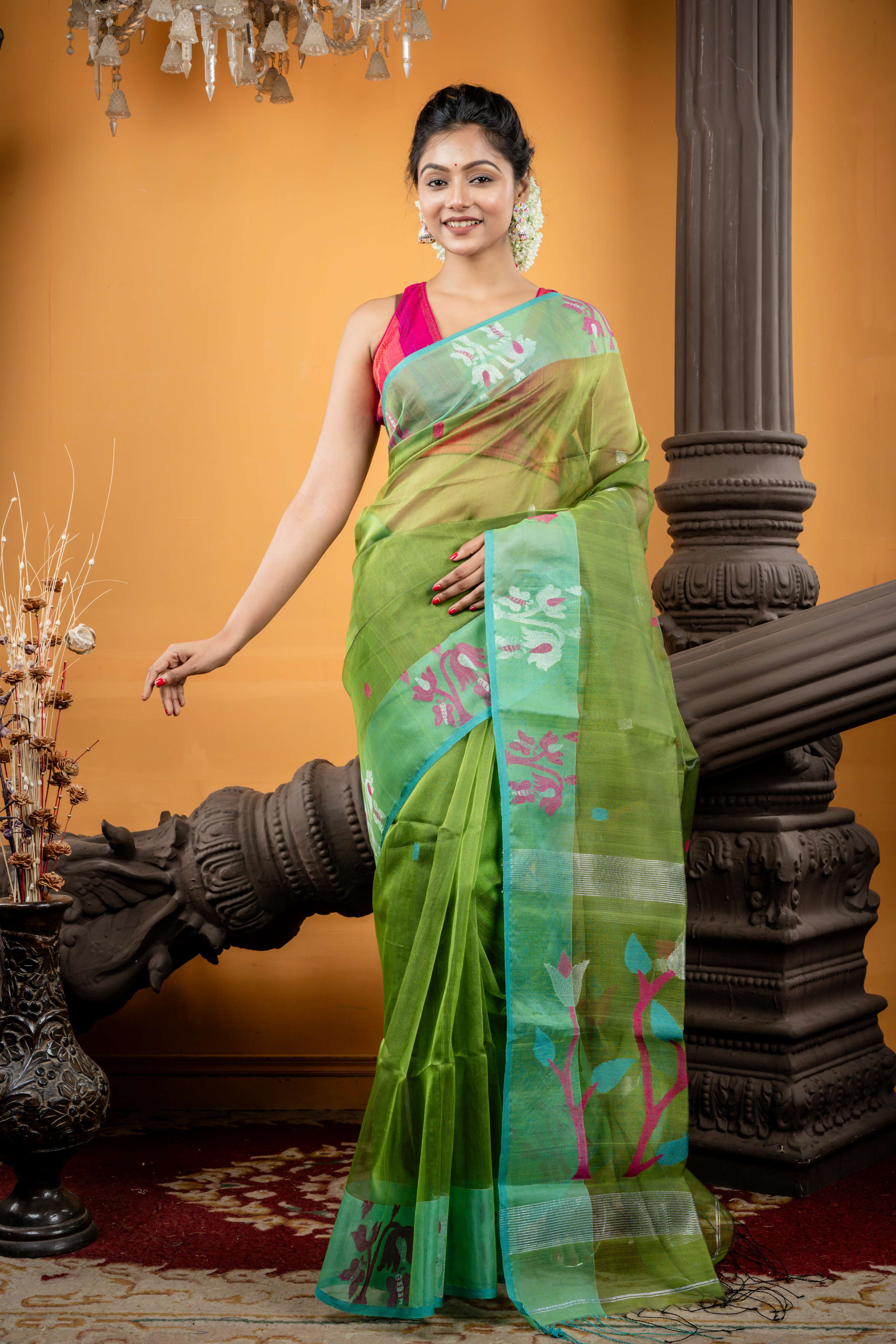 Triparna || Sap Green Premium Muslin Bengal Handloom Saree with all over Multi-colour & Silver Zari Buta and Parrot Green Jamdani Floral motif Border & Pallu