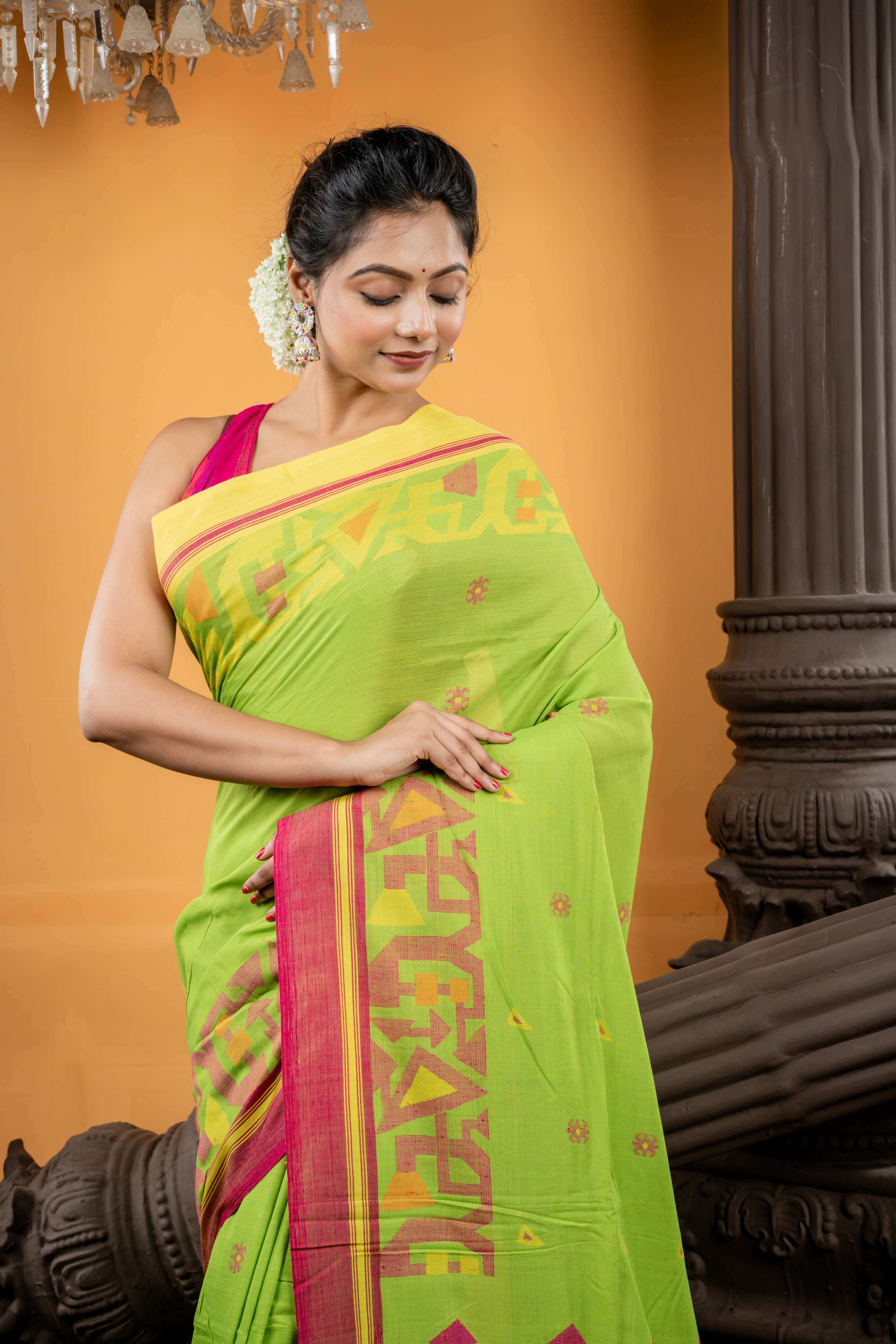Tiya || Parrot Green Cotton Bengal Handloom Saree with all over Multi-colour Buti, Lemon Yellow & Magenta Pink 'Ganga Jamuna' Border and Traditional design Pallu