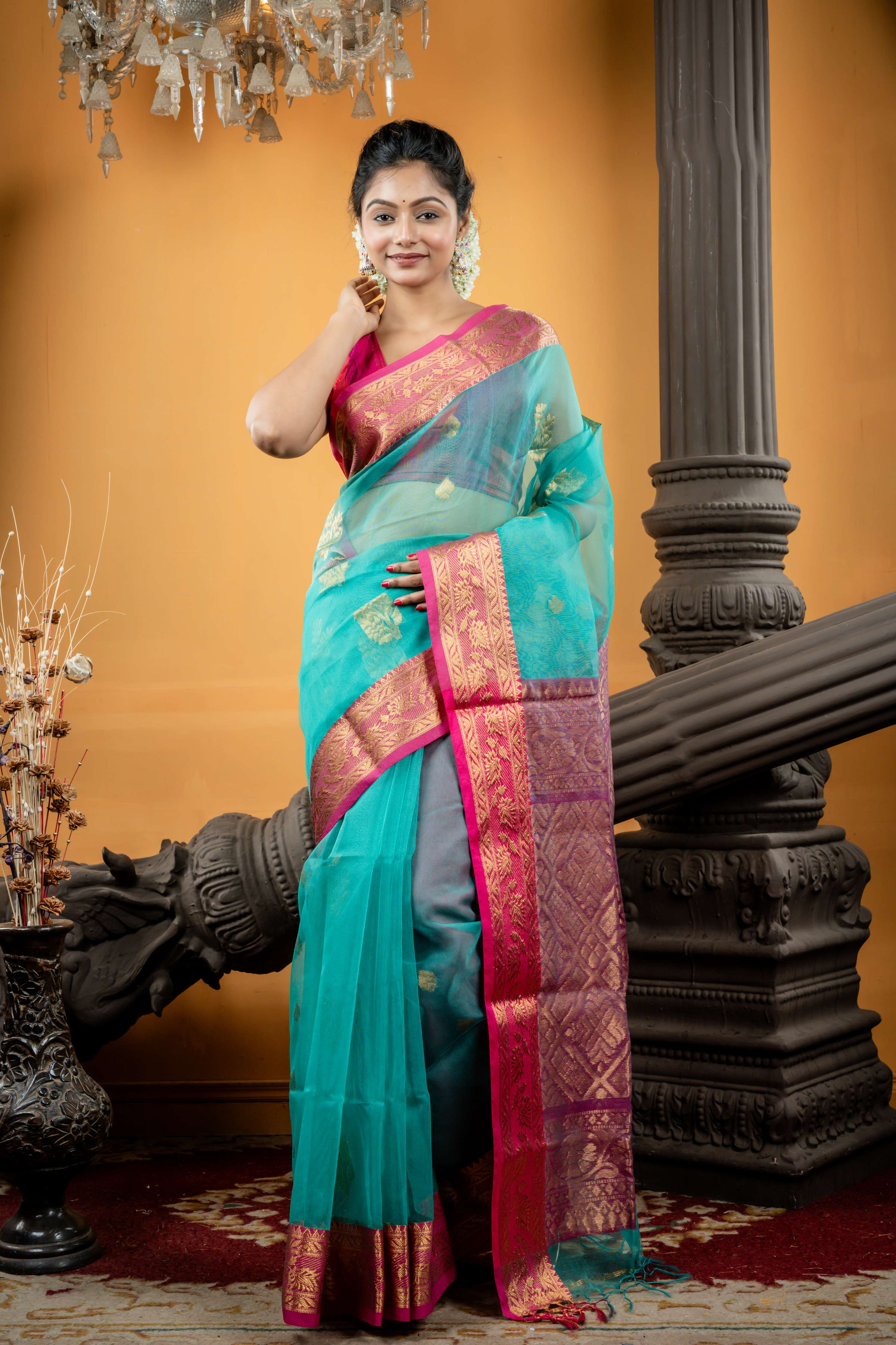 Ambalika || Teal Green Muslin Bengal Handloom Saree with all over Golden Zari Traditional Buta, Magenta Pink Border and dual tone Banarasi design Pallu