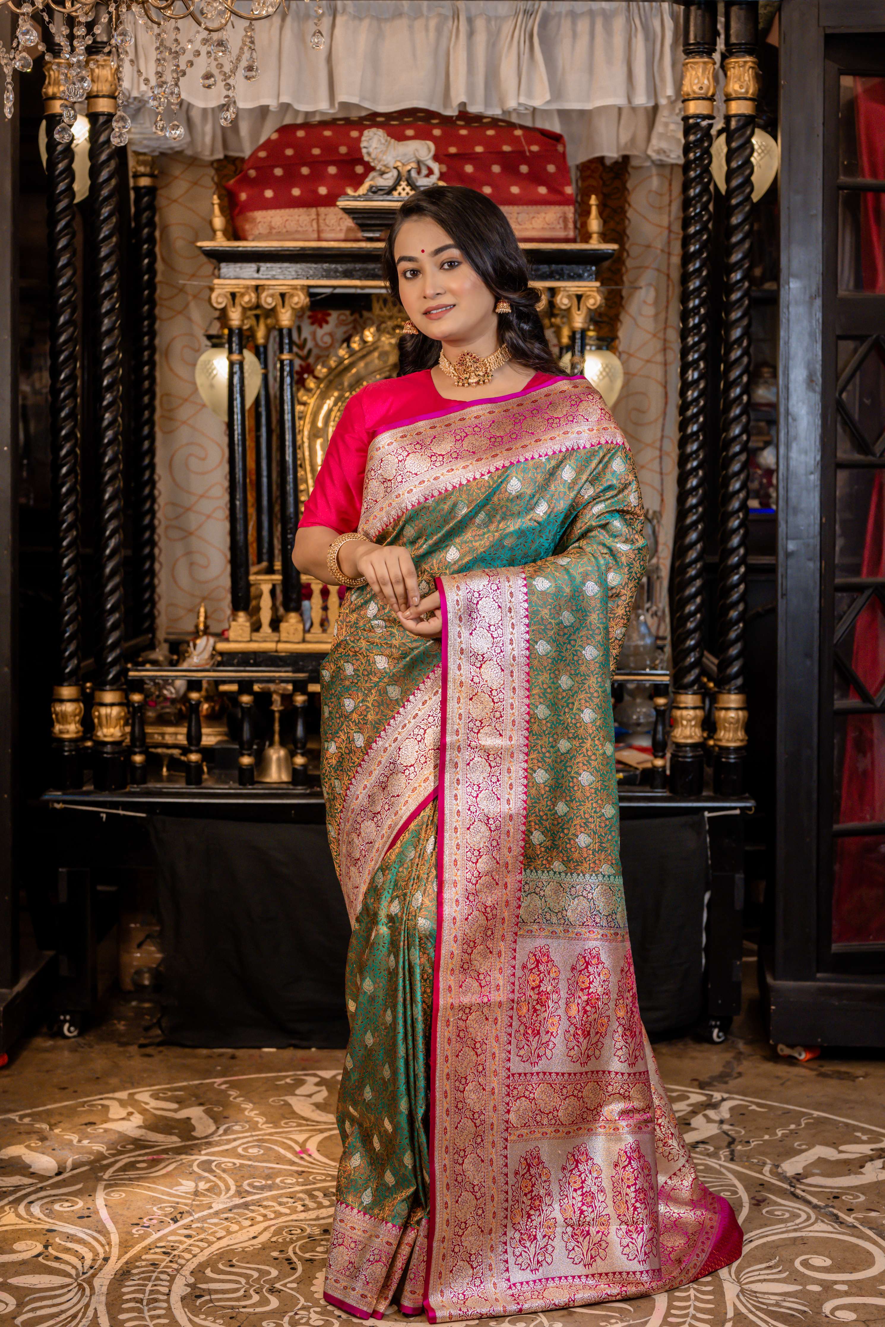 Vanisha || Traditional Banarasi Jamawar Saree on Green dual-tone Katan with all over Light Gold Zari Buta, Floral Jangla and Magenta Pink Border