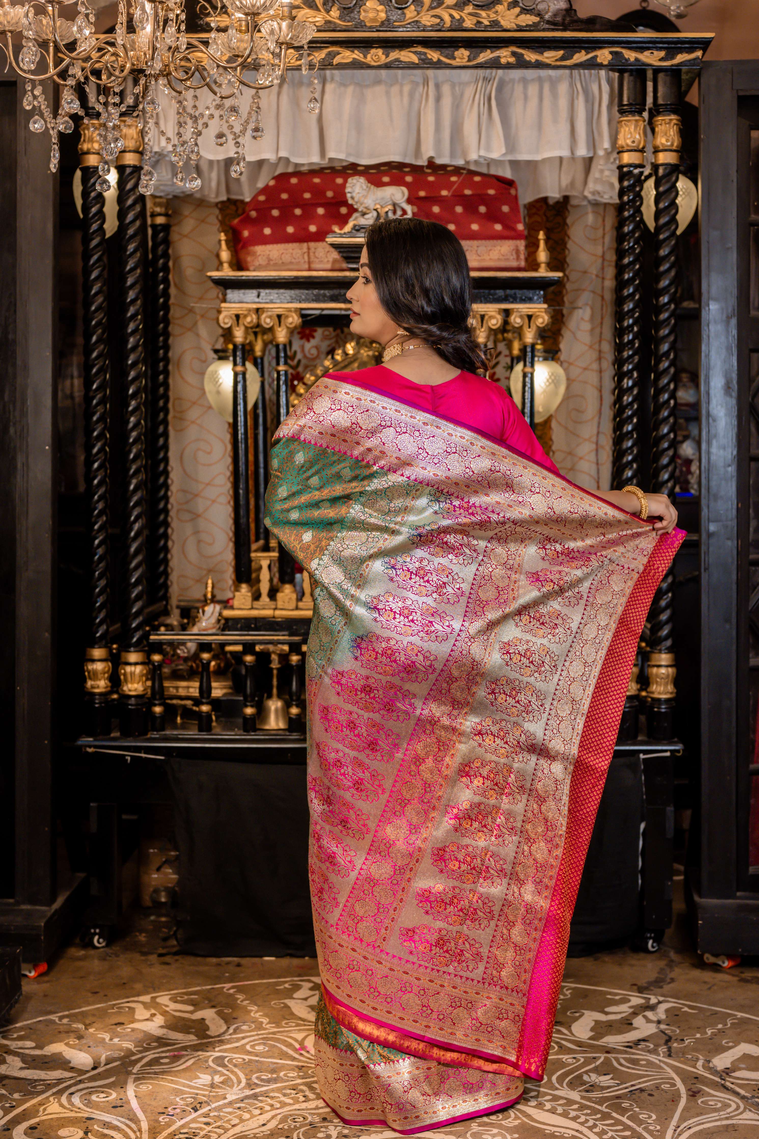 Vanisha || Traditional Banarasi Jamawar Saree on Green dual-tone Katan with all over Light Gold Zari Buta, Floral Jangla and Magenta Pink Border