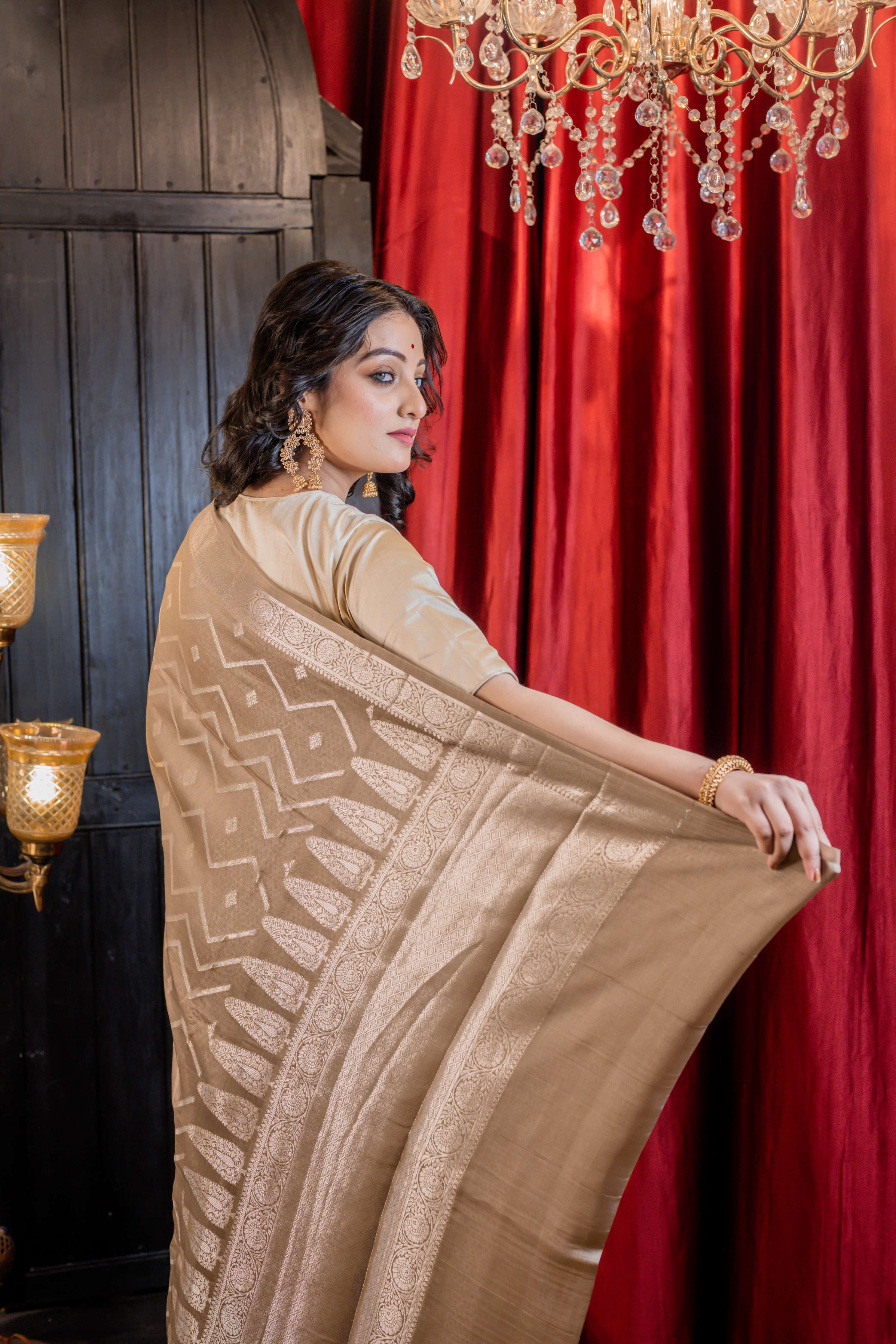 Urmika || Medium Taupe Brown Chinia Silk Banarasi Saree with all over Buta & Stripe Pallu woven in Silver Zari