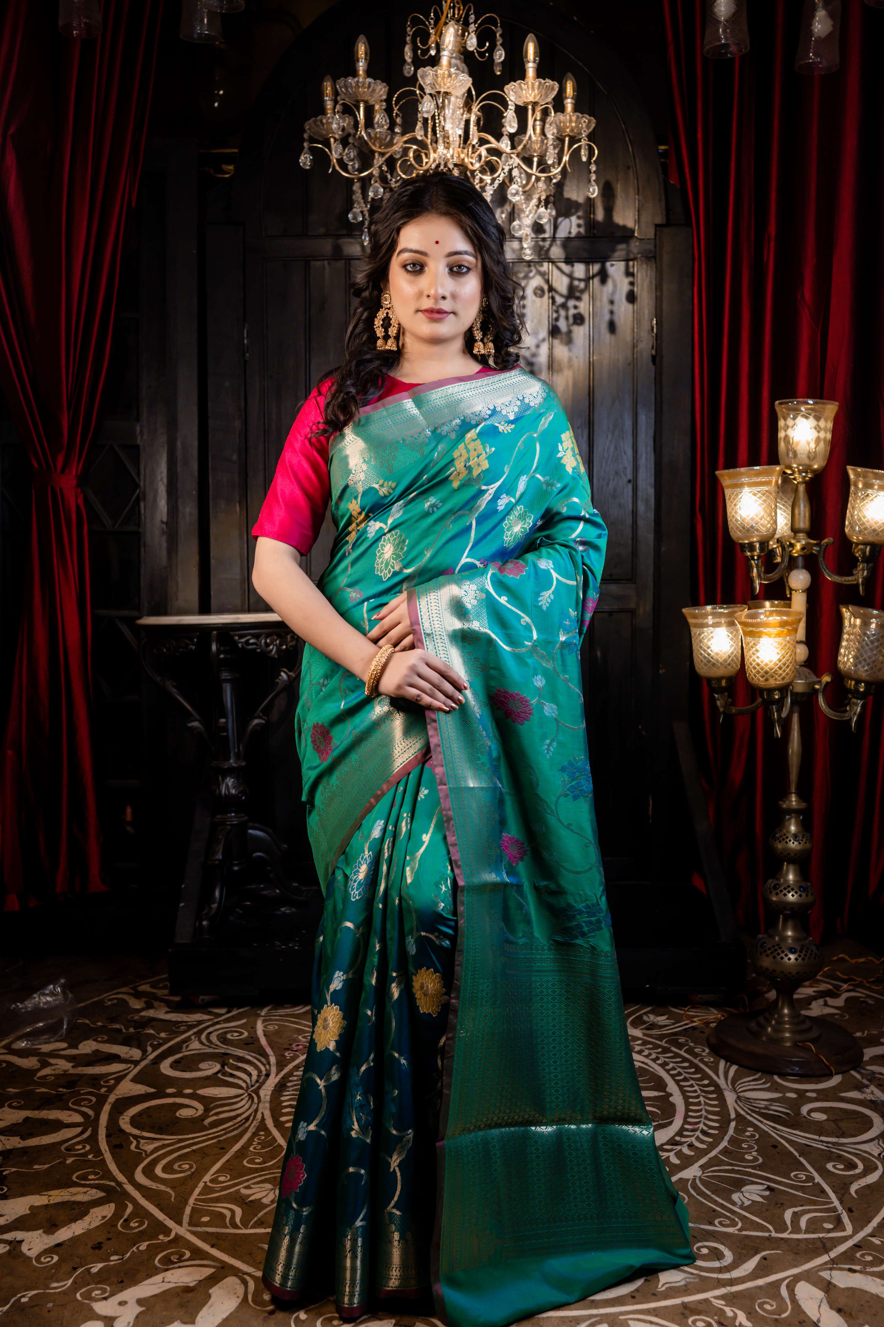 Kalapini || Green & Peacock Blue dual-tone Soft Silk Banarasi Saree with all over multi-colour Resham Floral motif and Jaal in Golden Zari