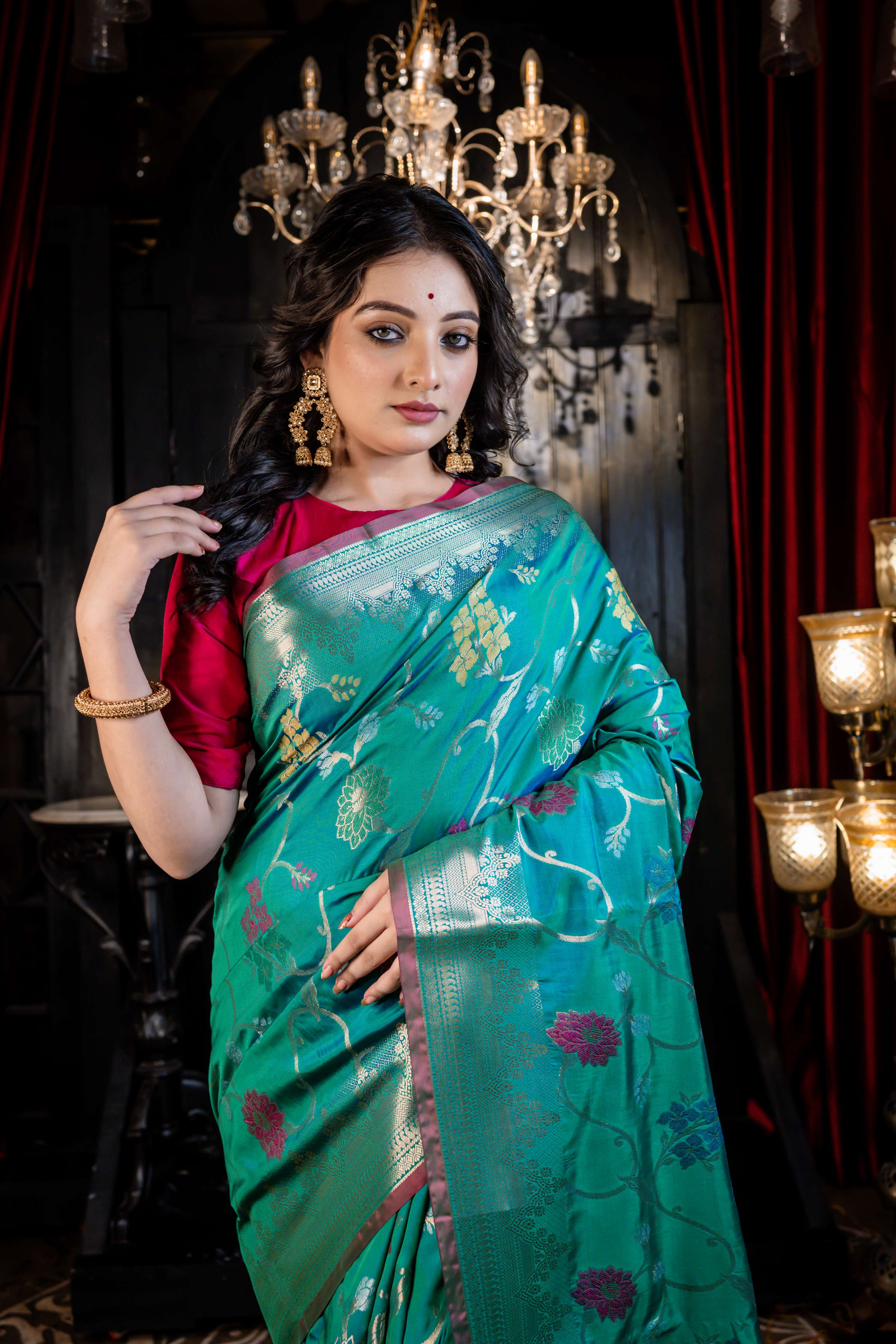 Kalapini || Green & Peacock Blue dual-tone Soft Silk Banarasi Saree with all over multi-colour Resham Floral motif and Jaal in Golden Zari
