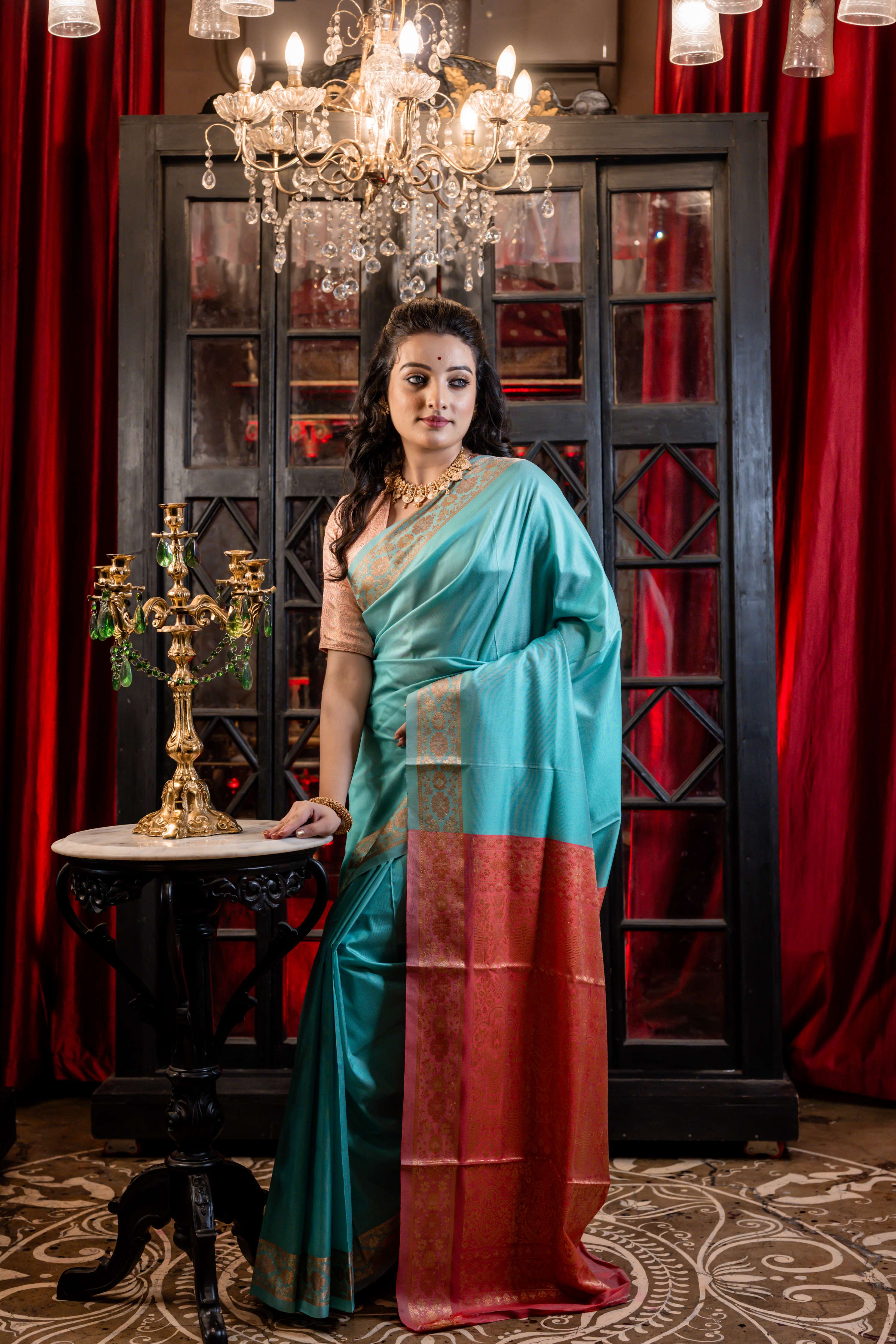 Sindhuja || Aqua Green Plain Body Soft Silk Banarasi Saree with Matte Gold & Copper Resham Floral motif Border and Dark Rose Pink Pallu