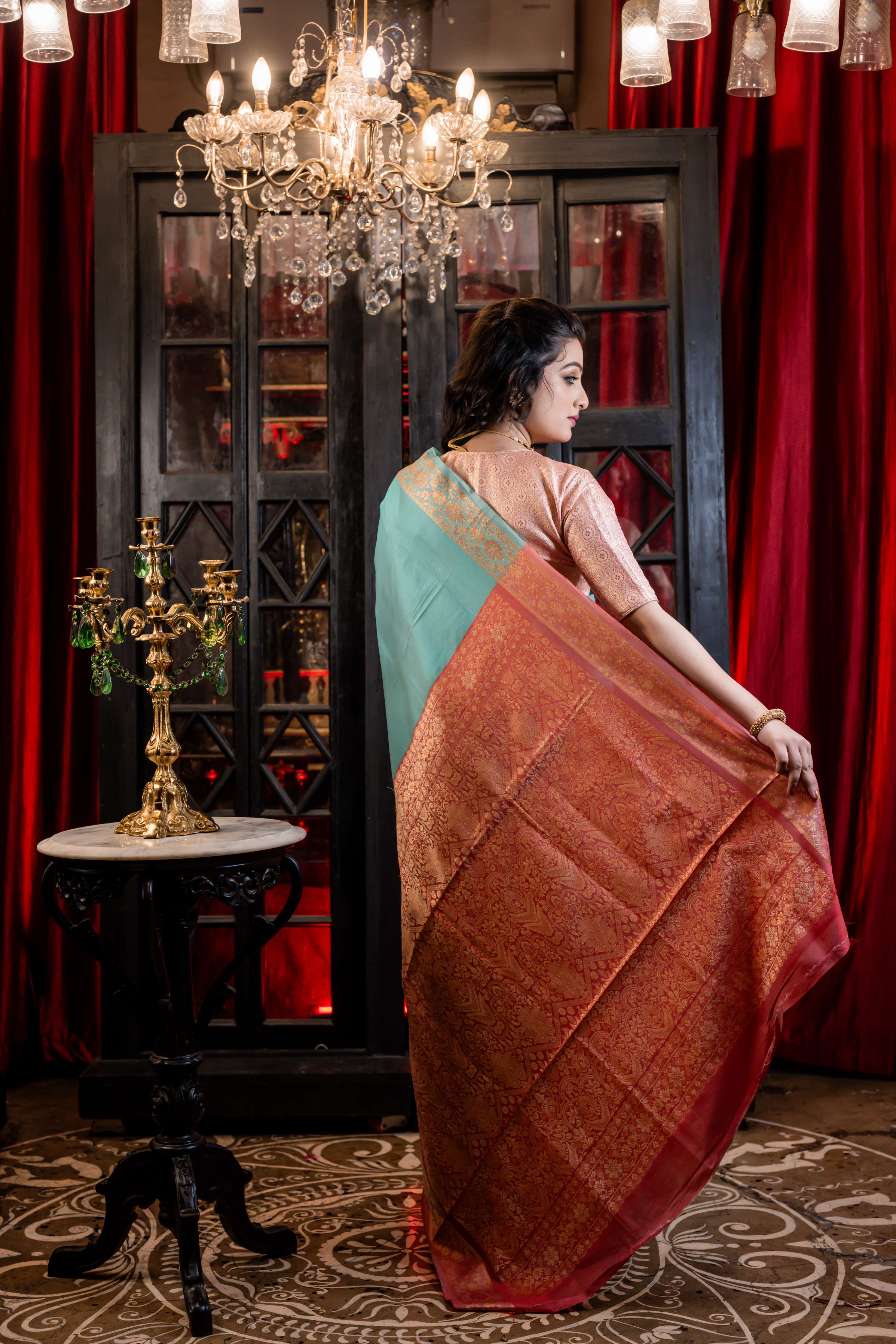 Sindhuja || Aqua Green Plain Body Soft Silk Banarasi Saree with Matte Gold & Copper Resham Floral motif Border and Dark Rose Pink Pallu