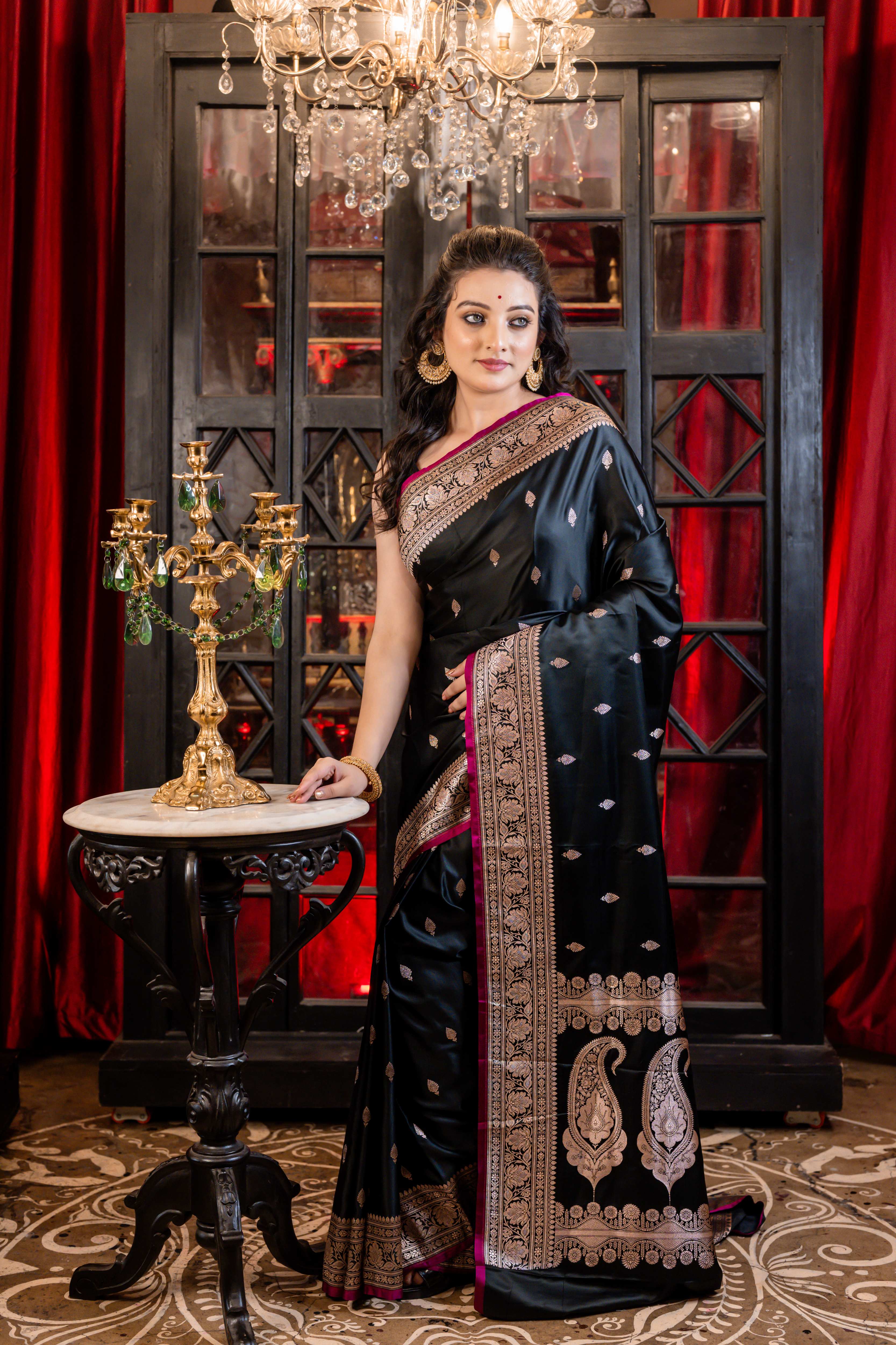 Yamini || Black Banarasi Mashru Silk Banarasi Saree with all over Copper Zari Buta and sleek Magenta border